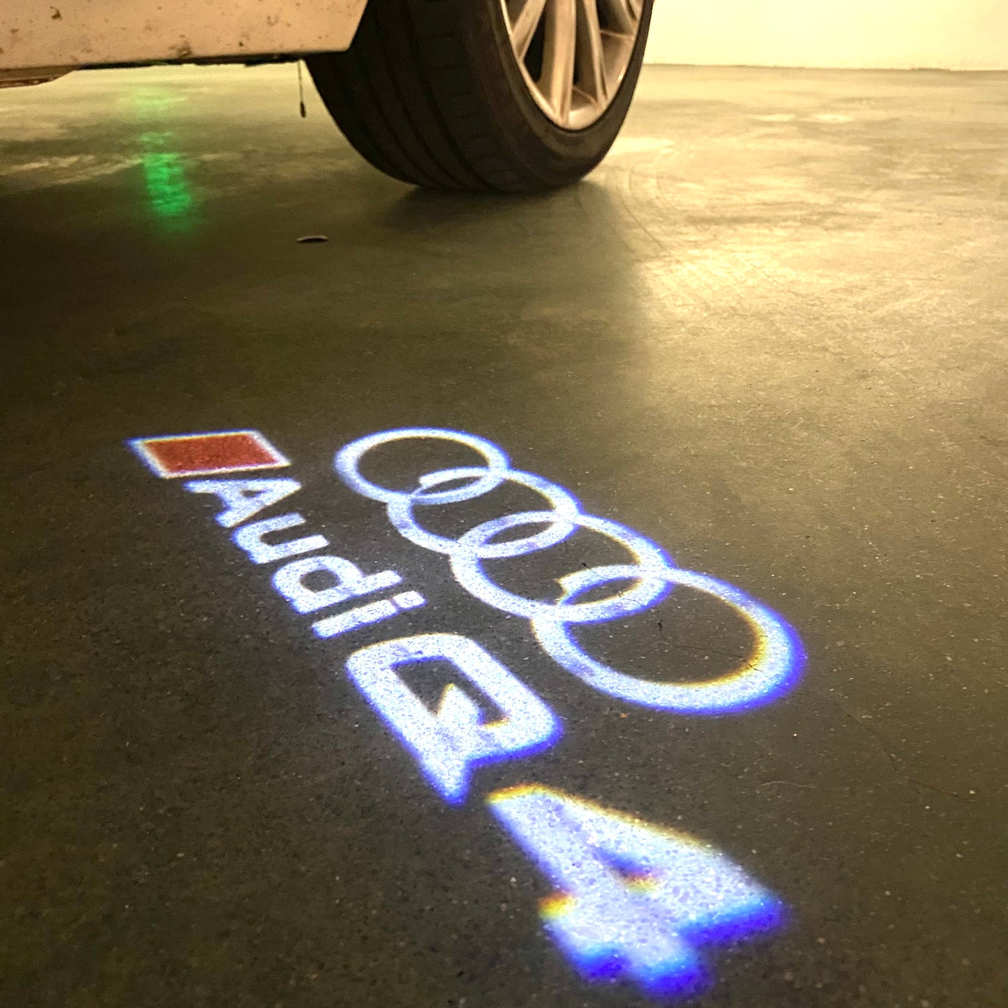 AUDI Q4 LOGO PROJECTOT LIGHTS (quantity 1 = 2 Logo Films /2 door lights)Nr.12B24