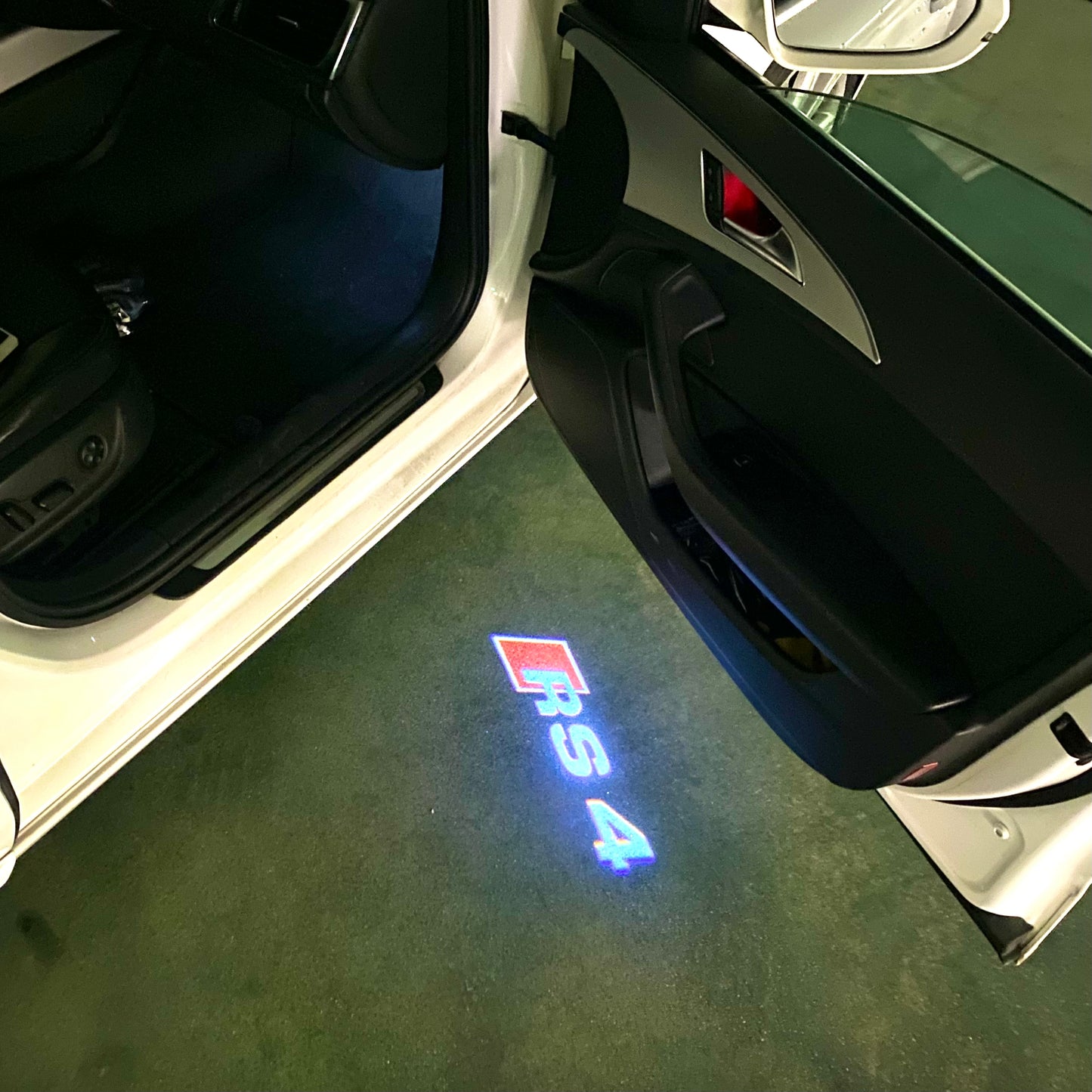 AUDI RS4 LOGO PROJECTOT LIGHTS Nr.53 (quantity 1 = 2 Logo Films /2 door lights)