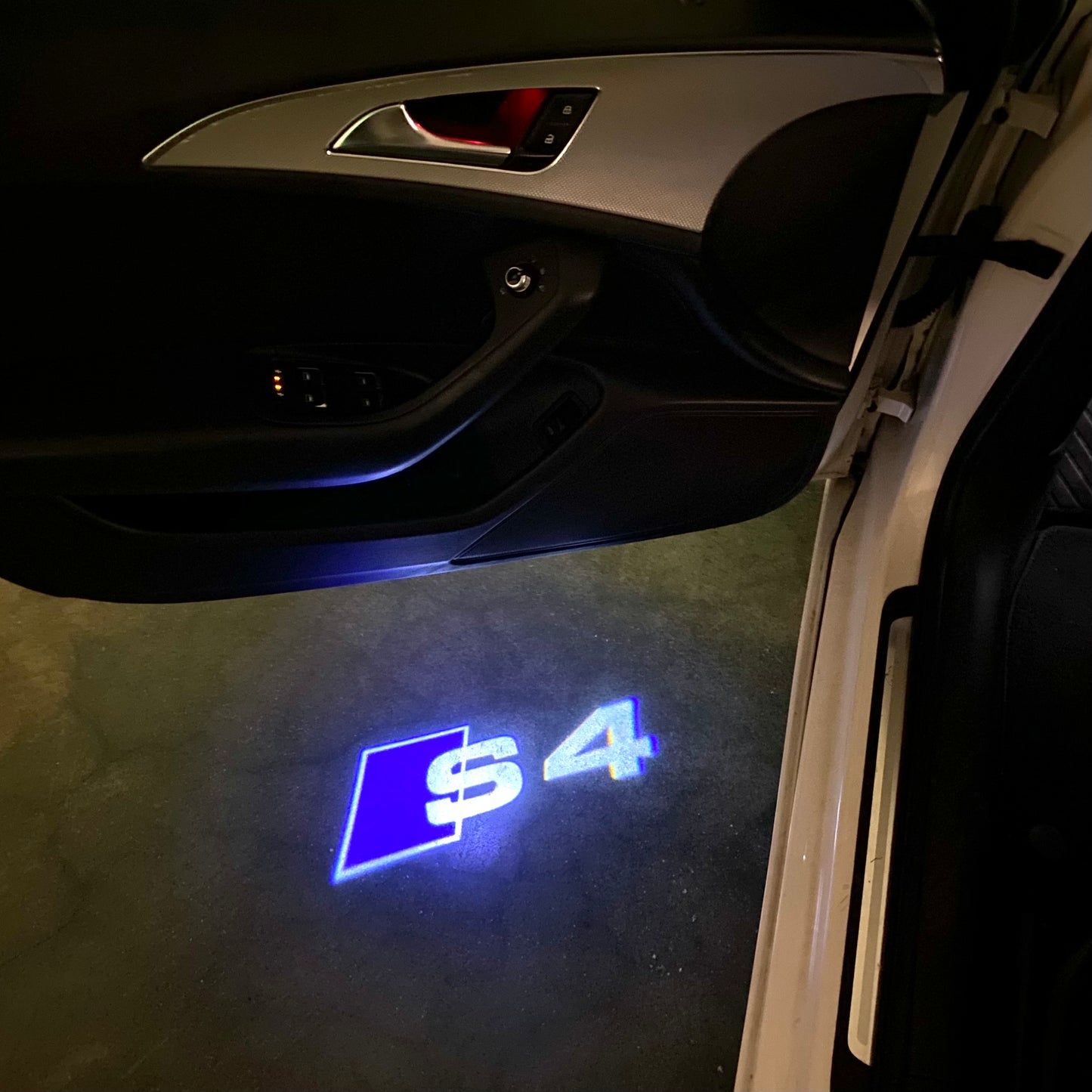 AUDI S4 LOGO PROJECTOT LIGHTS Nr.129 (quantity 1 = 2 Logo Films /2 door lights)