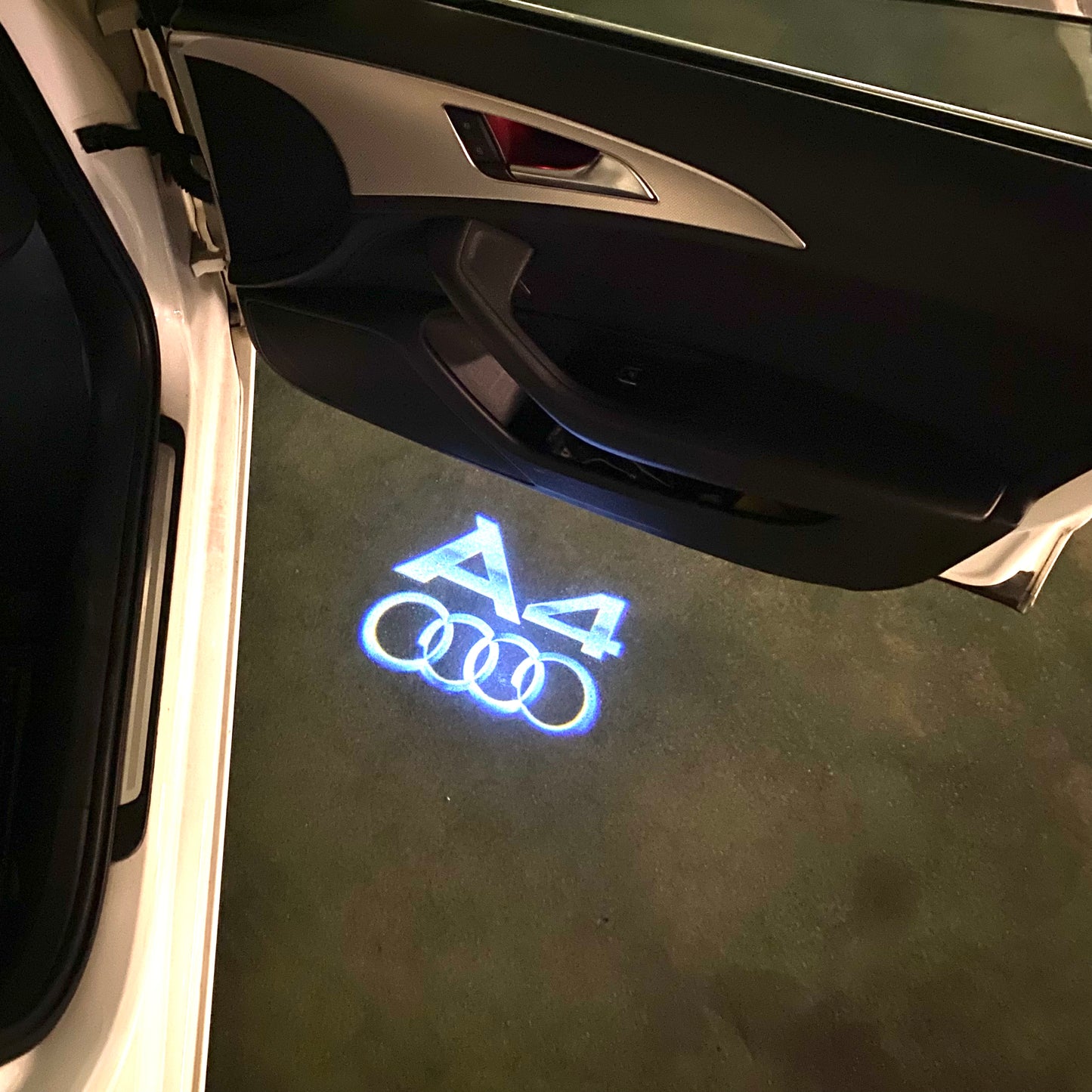 AUDI A4 LOGO PROJECTOT LIGHTS (quantity 1 = 2 Logo Films /2 door lights)Nr.12B95