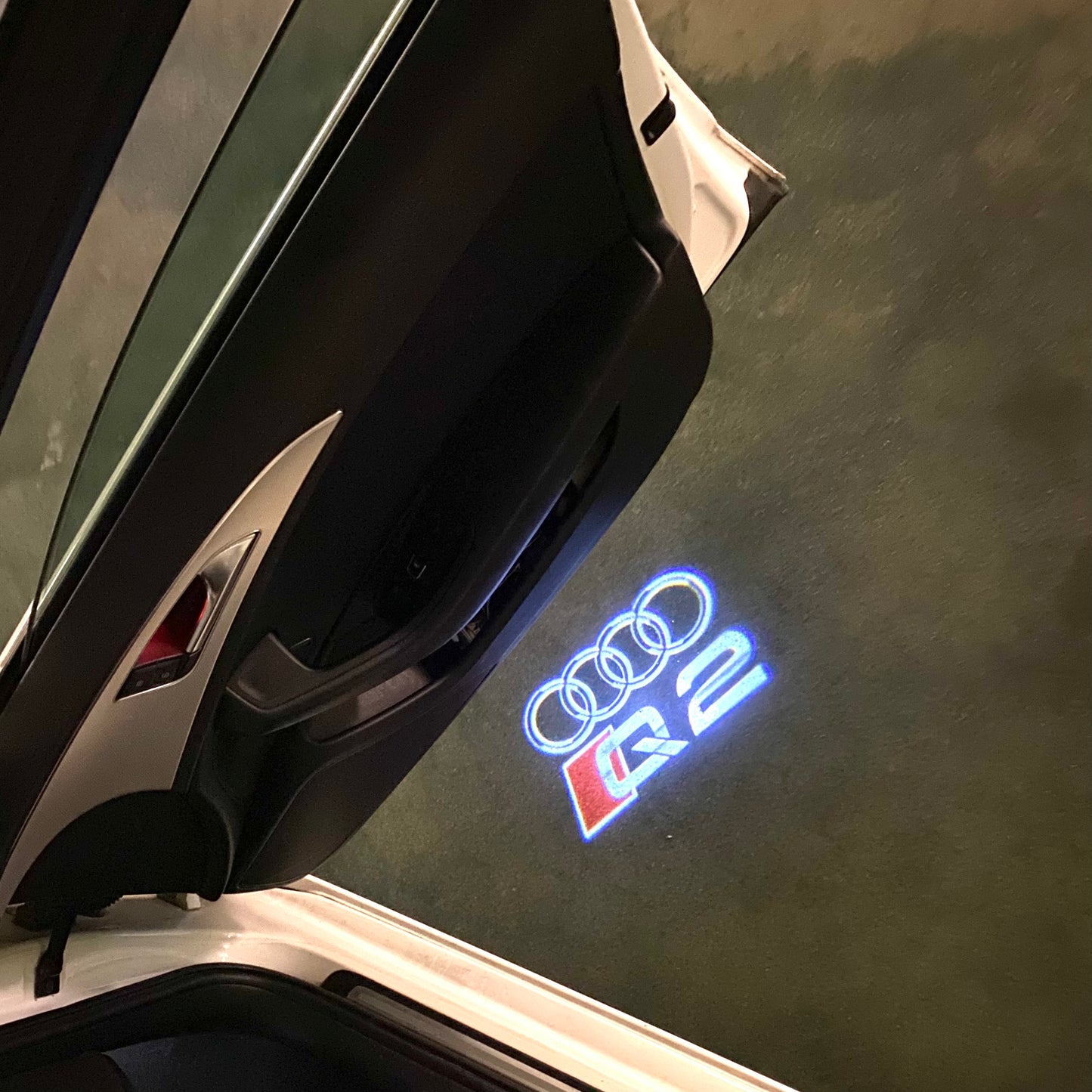 AUDI Q2 LOGO PROJECTOT LIGHTS (quantity 1 = 2 Logo Films /2 door lights)Nr.12B65