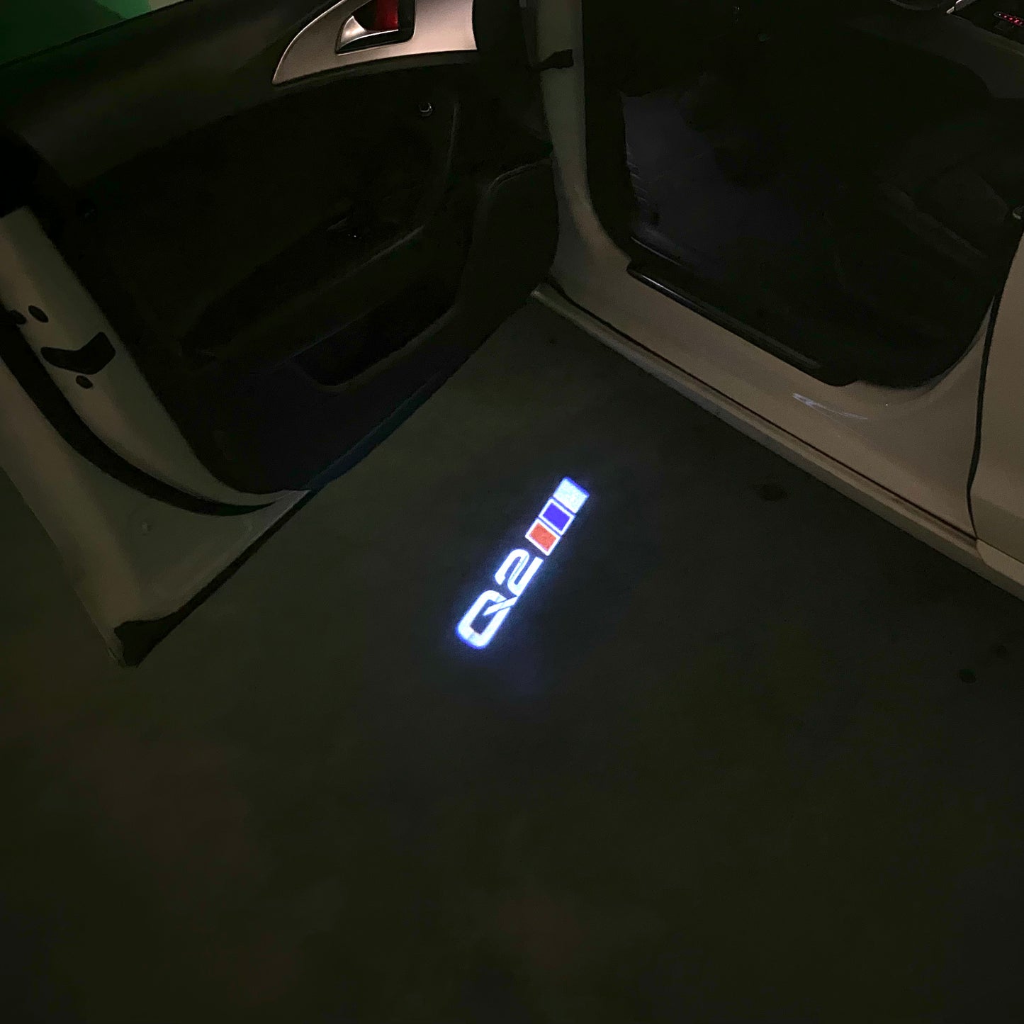 AUDI Q2 LOGO PROJECTOT LIGHTS (quantity 1 = 2 Logo Films /2 door lights)Nr.12B40