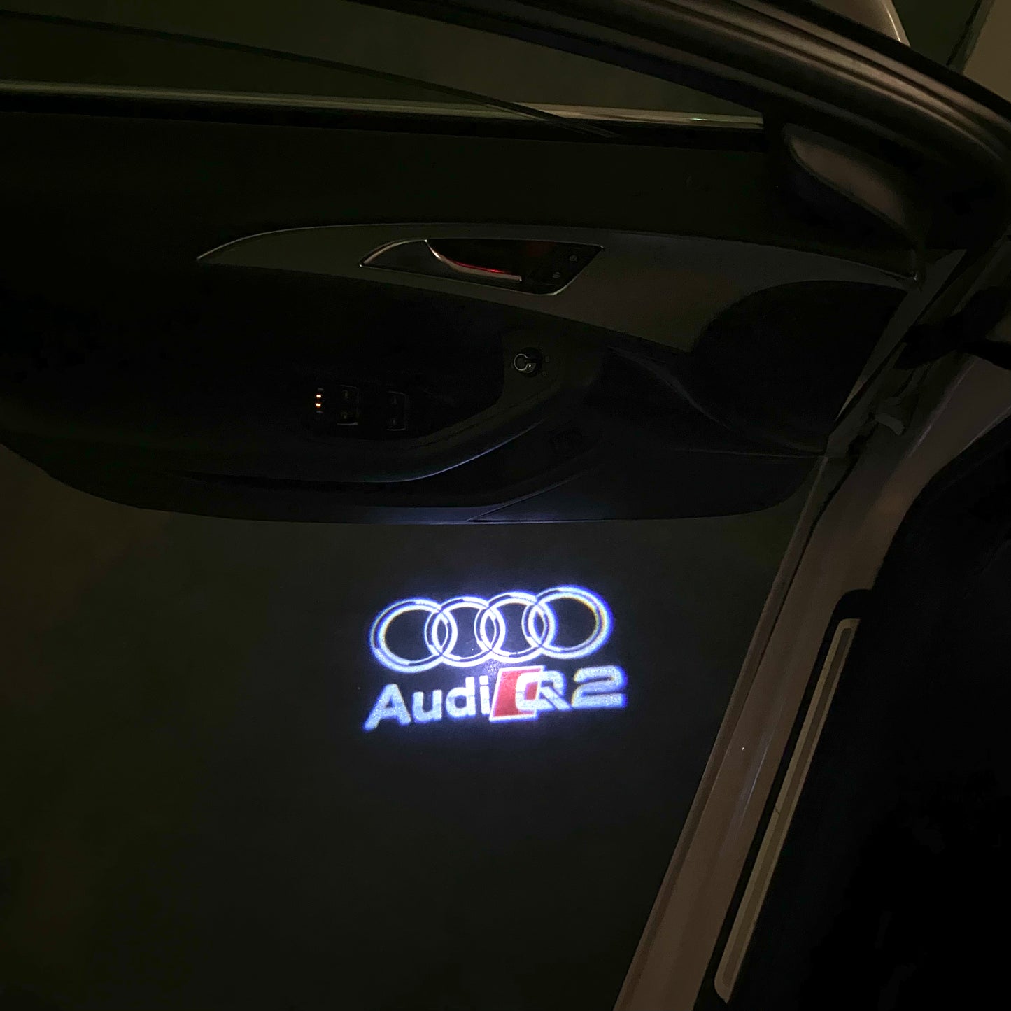 AUDI Q2 LOGO PROJECTOT LIGHTS (quantity 1 = 2 Logo Films /2 door lights)Nr.12B32