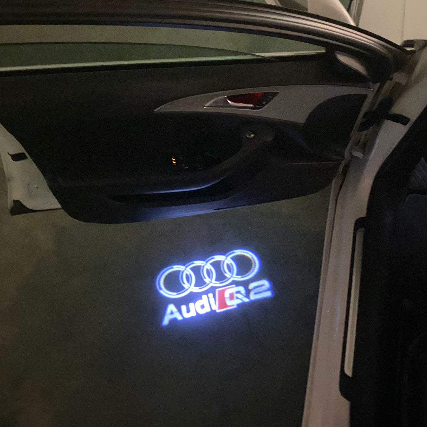 AUDI Q2 LOGO PROJECTOT LIGHTS (quantity 1 = 2 Logo Films /2 door lights)Nr.12B32
