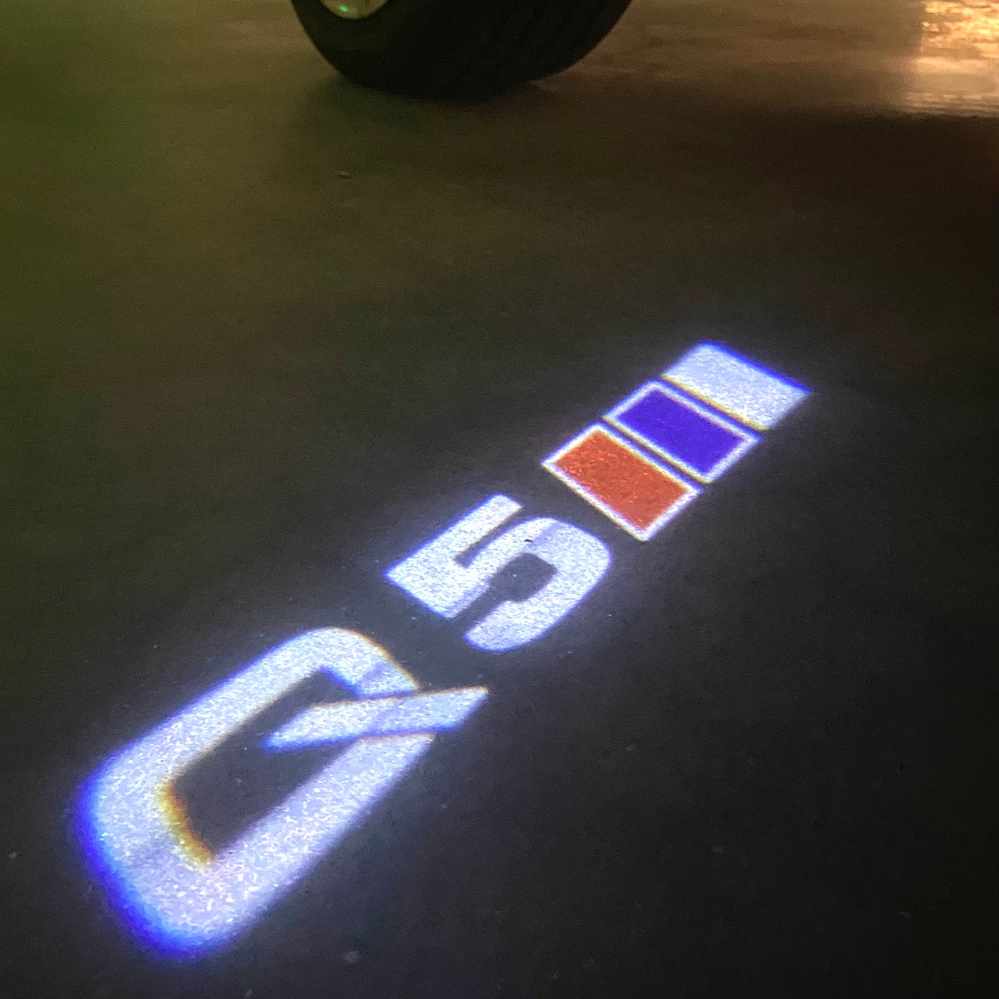 AUDI Q5 LOGO PROJECTOT LIGHTS (quantity 1 = 2 Logo Films /2 door lights)Nr.12B70