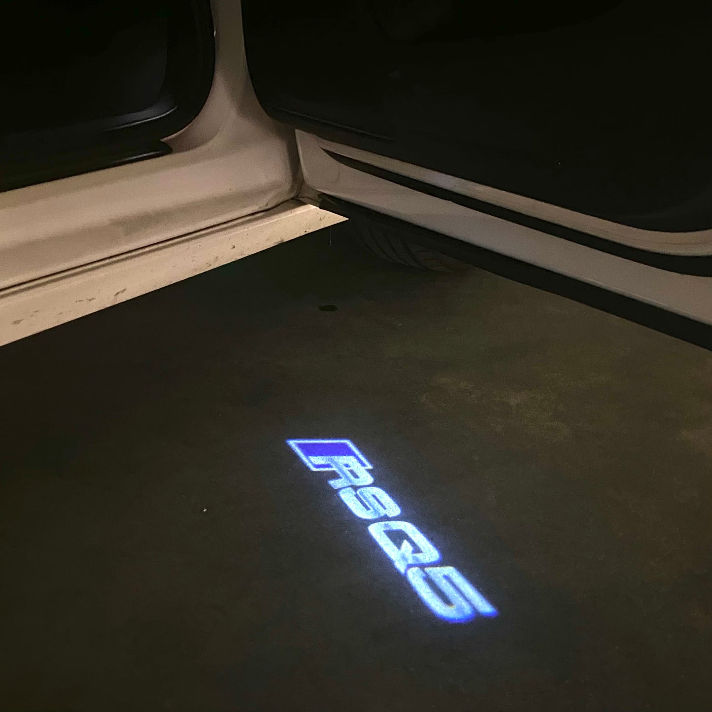 AUDI RSQ5 LOGO PROJECTOT LIGHTS (quantity 1 = 2 Logo Films /2 door lights)Nr.12B96