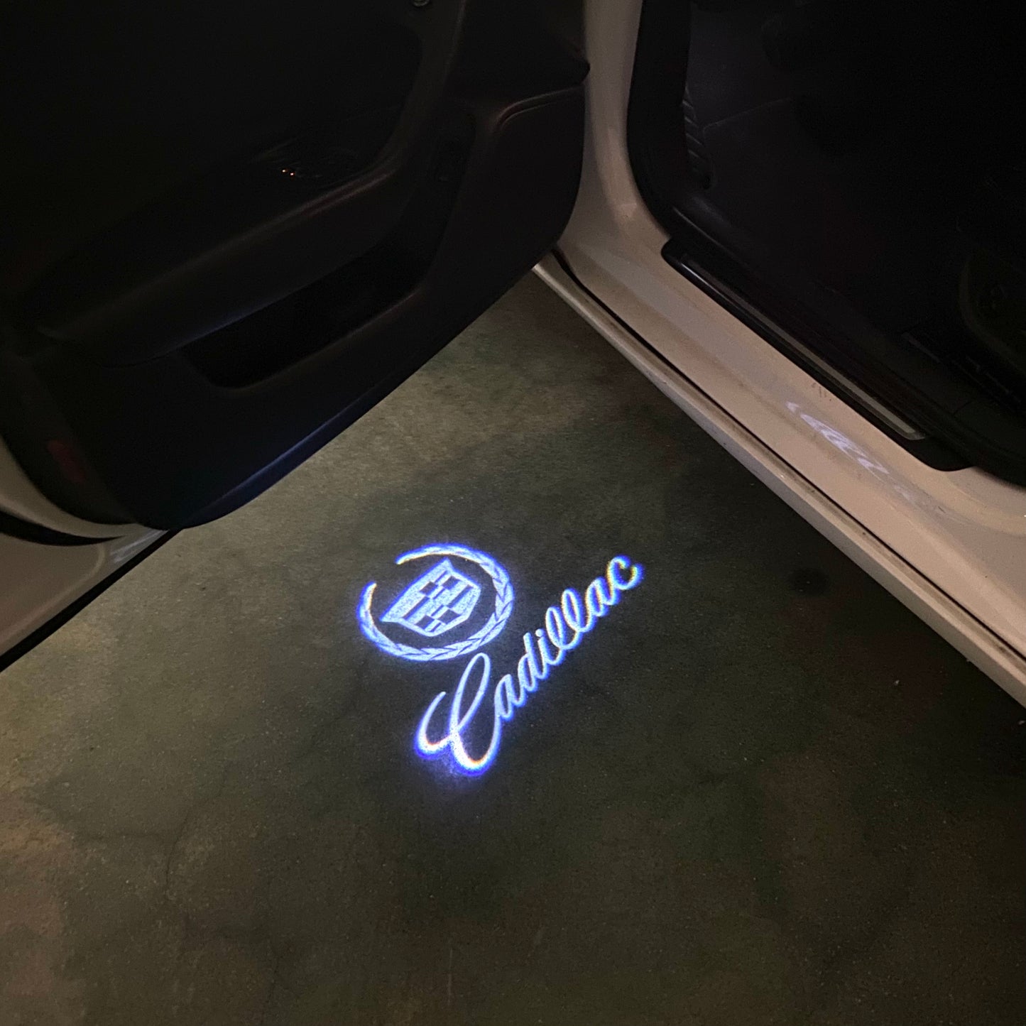 CADILLAC ORIGINAL LOGO PROJECTOT LIGHTS Nr.9722 (quantity 1 = 2 Logo Films /2 door lights)