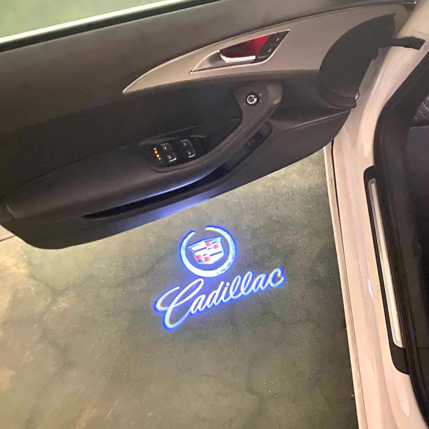 CADILLAC ORIGINAL LOGO PROJECTOT LIGHTS Nr.9727 (quantity 1 = 2 Logo Films /2 door lights)