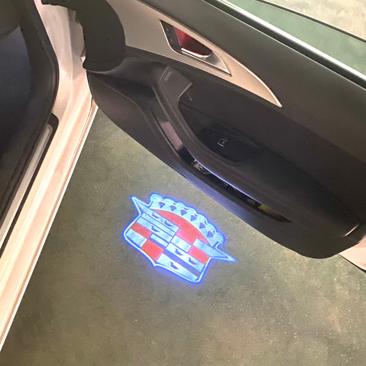 CADILLAC ORIGINAL LOGO PROJECTOT LIGHTS Nr.9750 (quantity 1 = 2 Logo Films /2 door lights)