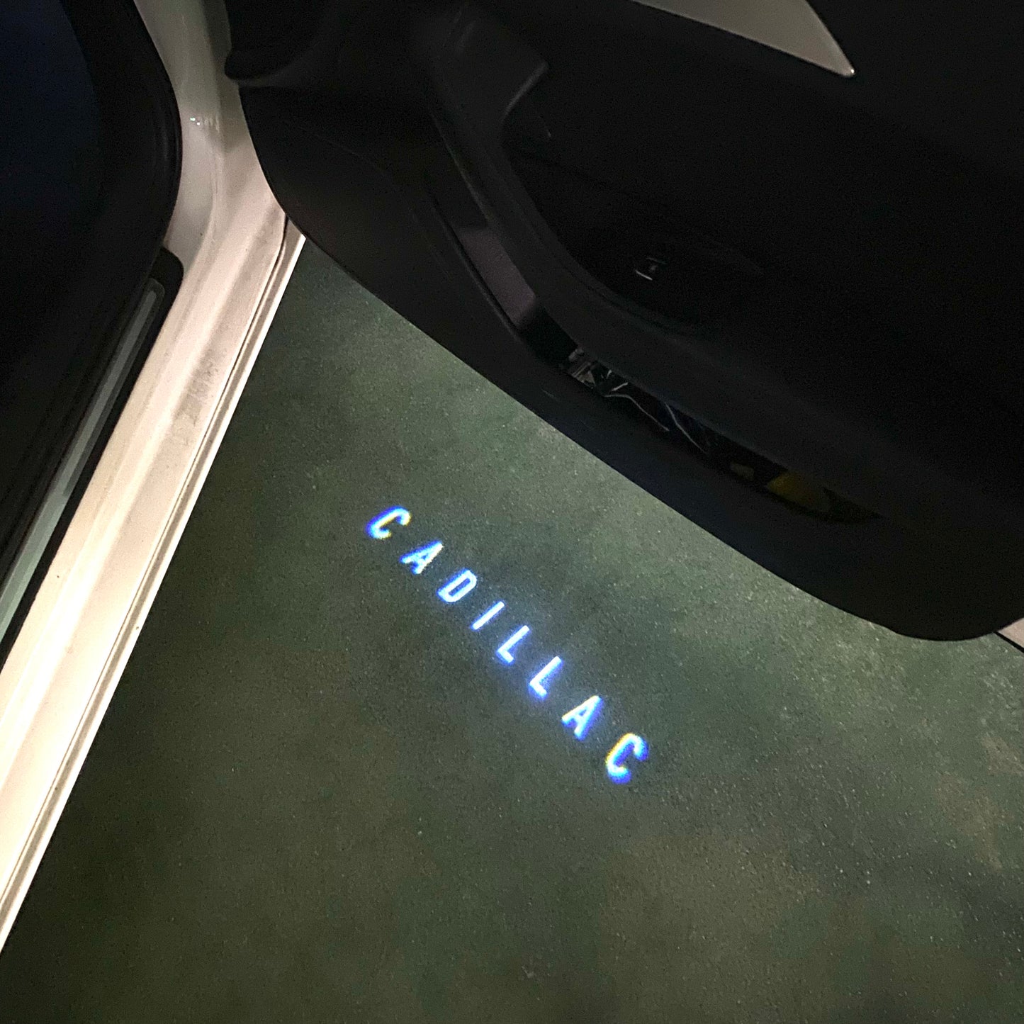 CADILLAC ORIGINAL LOGO PROJECTOT LIGHTS Nr.9749 (quantity 1 = 2 Logo Films /2 door lights)