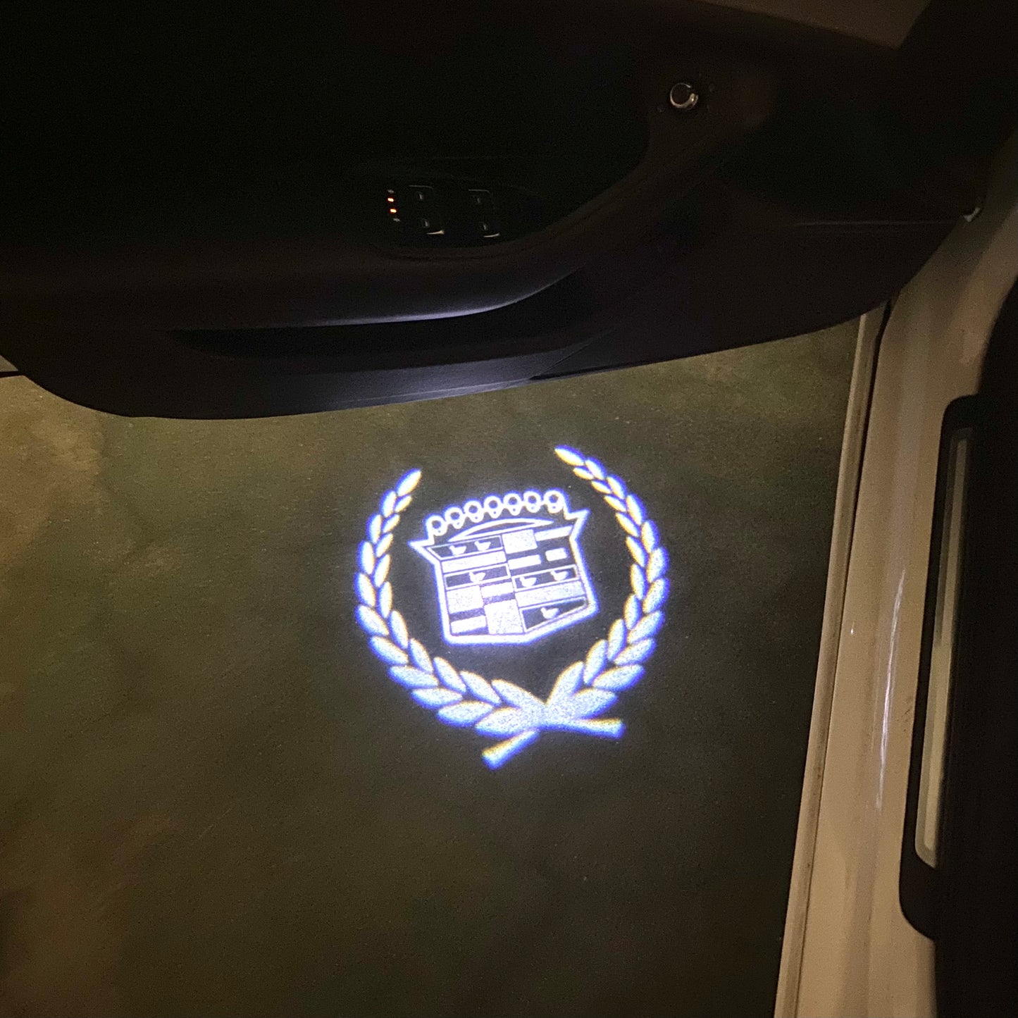 CADILLAC ORIGINAL LOGO PROJECTOT LIGHTS Nr.9747 (quantity 1 = 2 Logo Films /2 door lights)