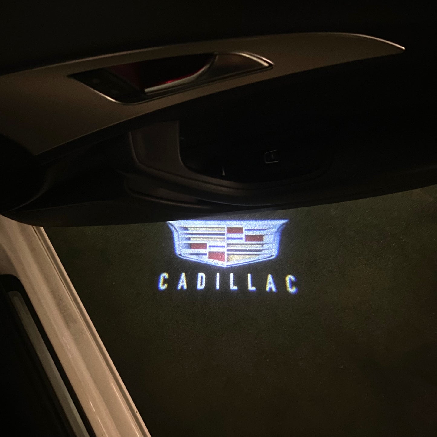CADILLAC ORIGINAL LOGO PROJECTOT LIGHTS Nr.9775 (quantity 1 = 2 Logo Films /2 door lights)