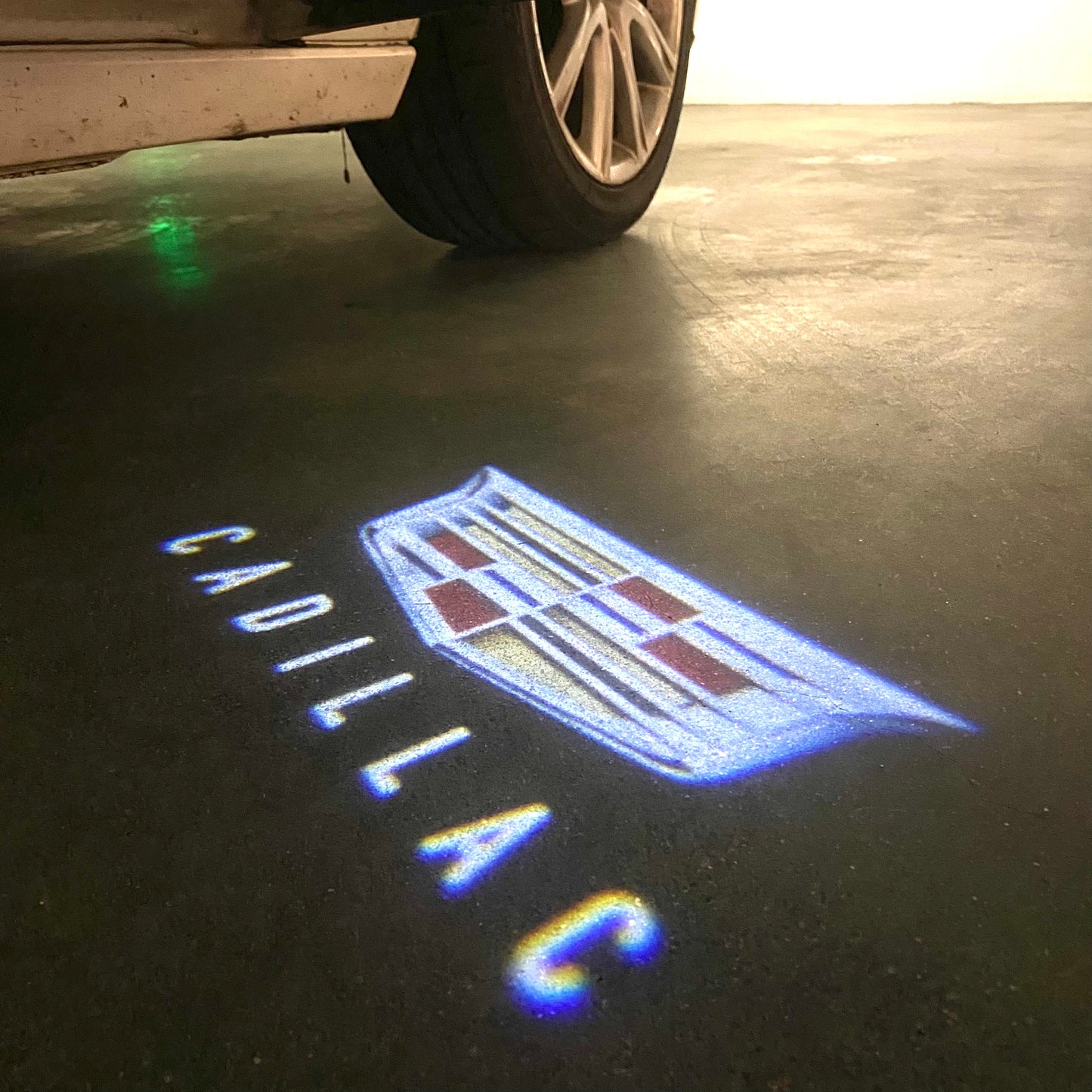 CADILLAC ORIGINAL LOGO PROJECTOT LIGHTS Nr.9775 (quantity 1 = 2 Logo Films /2 door lights)