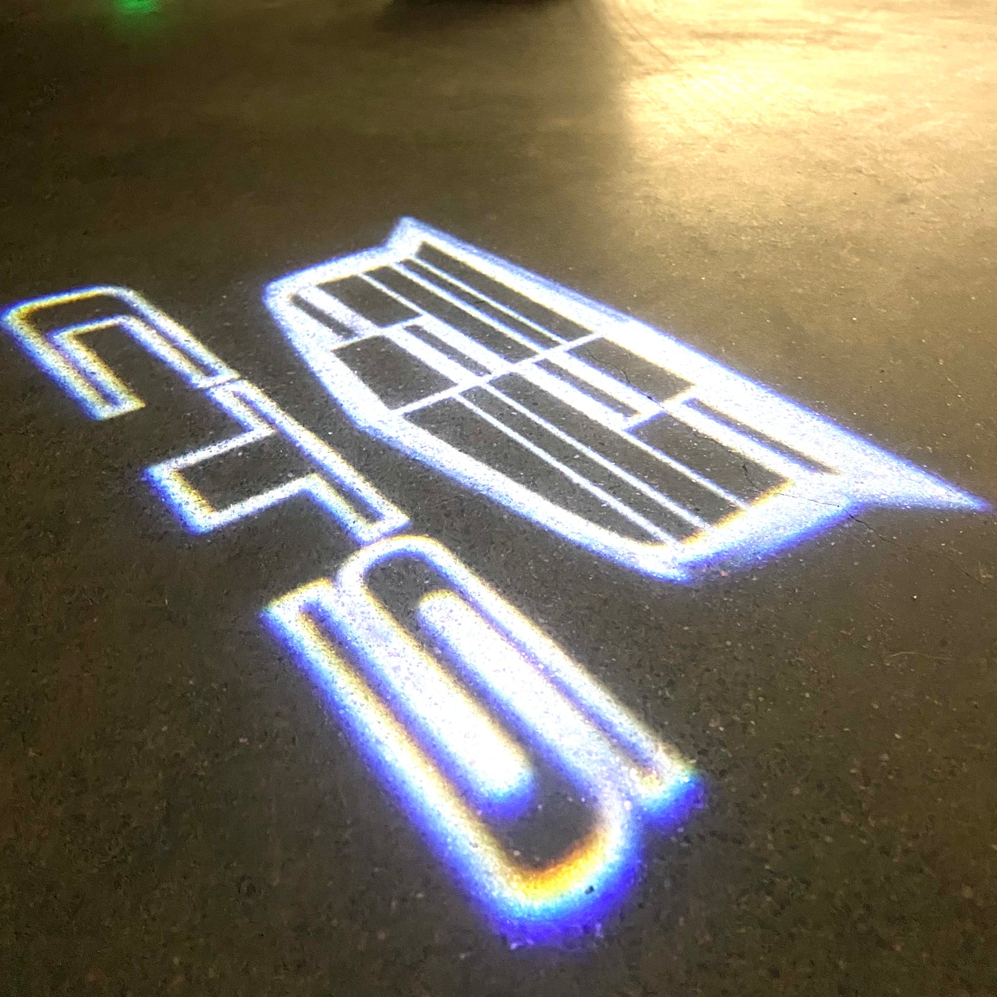 CADILLAC CTS LOGO PROJECTOT LIGHTS Nr.9734 (quantity 1 = 2 Logo Films /2 door lights)