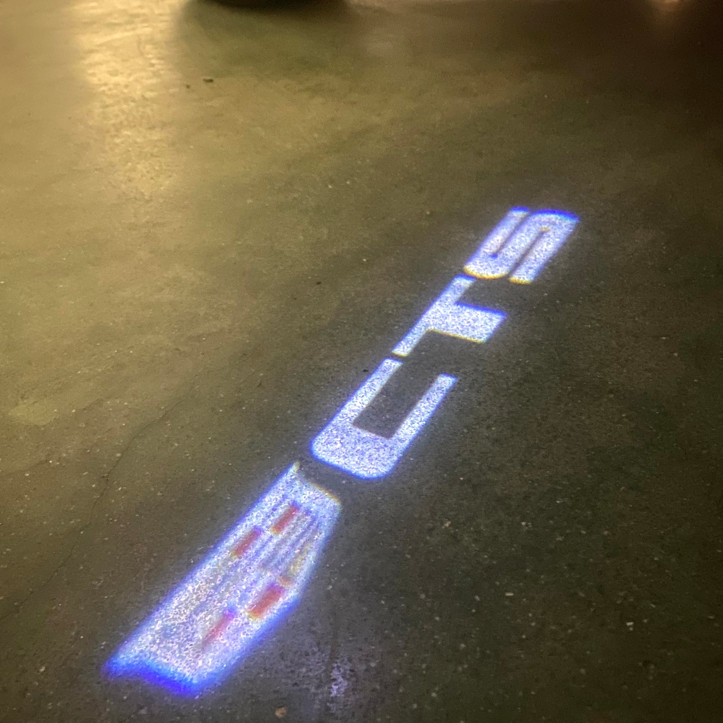 CADILLAC CTS LOGO PROJECTOT LIGHTS Nr.9799 (quantity 1 = 2 Logo Films /2 door lights)