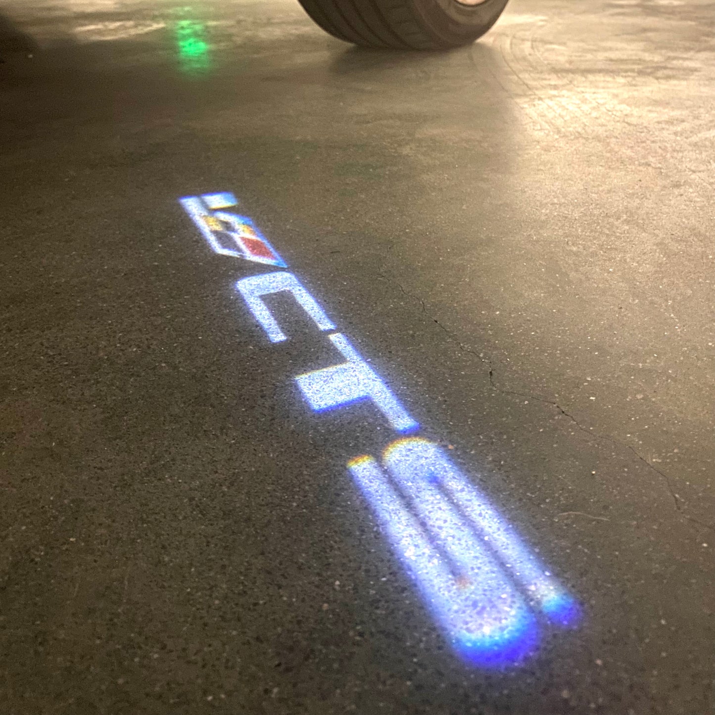 CADILLAC CTS LOGO PROJECTOT LIGHTS Nr.9799 (quantity 1 = 2 Logo Films /2 door lights)