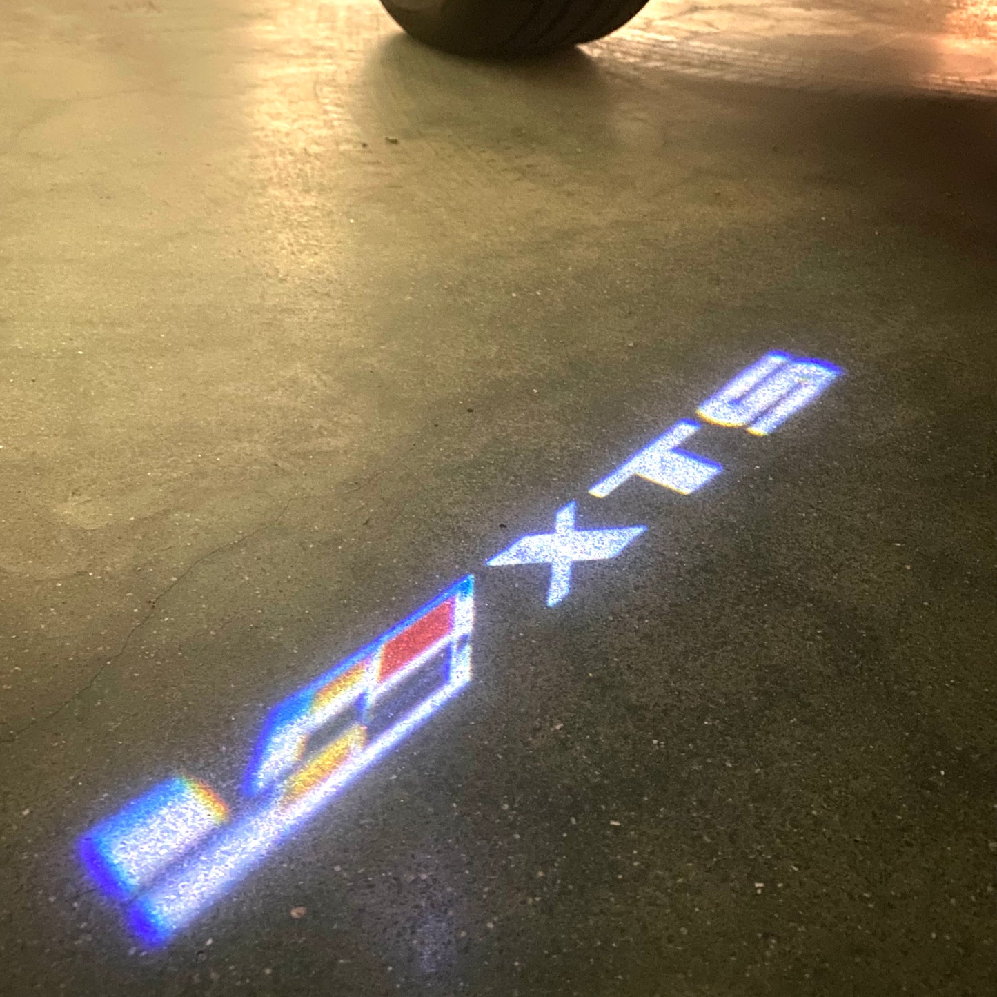 CADILLAC XTS LOGO PROJECTOT LIGHTS Nr.9802 (quantity 1 = 2 Logo Films /2 door lights)