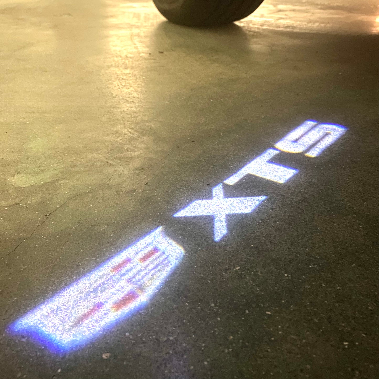 CADILLAC XTS LOGO PROJECTOT LIGHTS Nr.9797 (quantity 1 = 2 Logo Films /2 door lights)