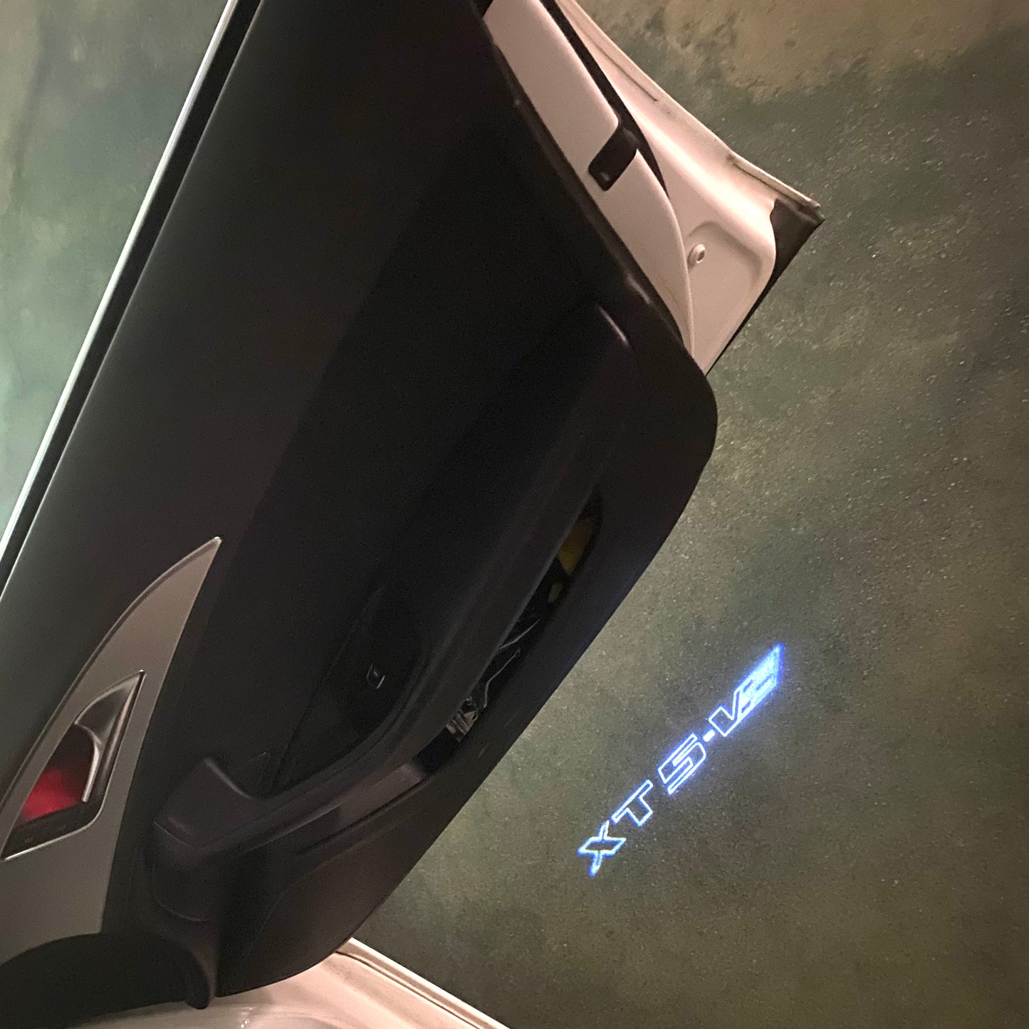 CADILLAC XTS LOGO PROJECTOT LIGHTS Nr.9780 (quantity 1 = 2 Logo Films /2 door lights)