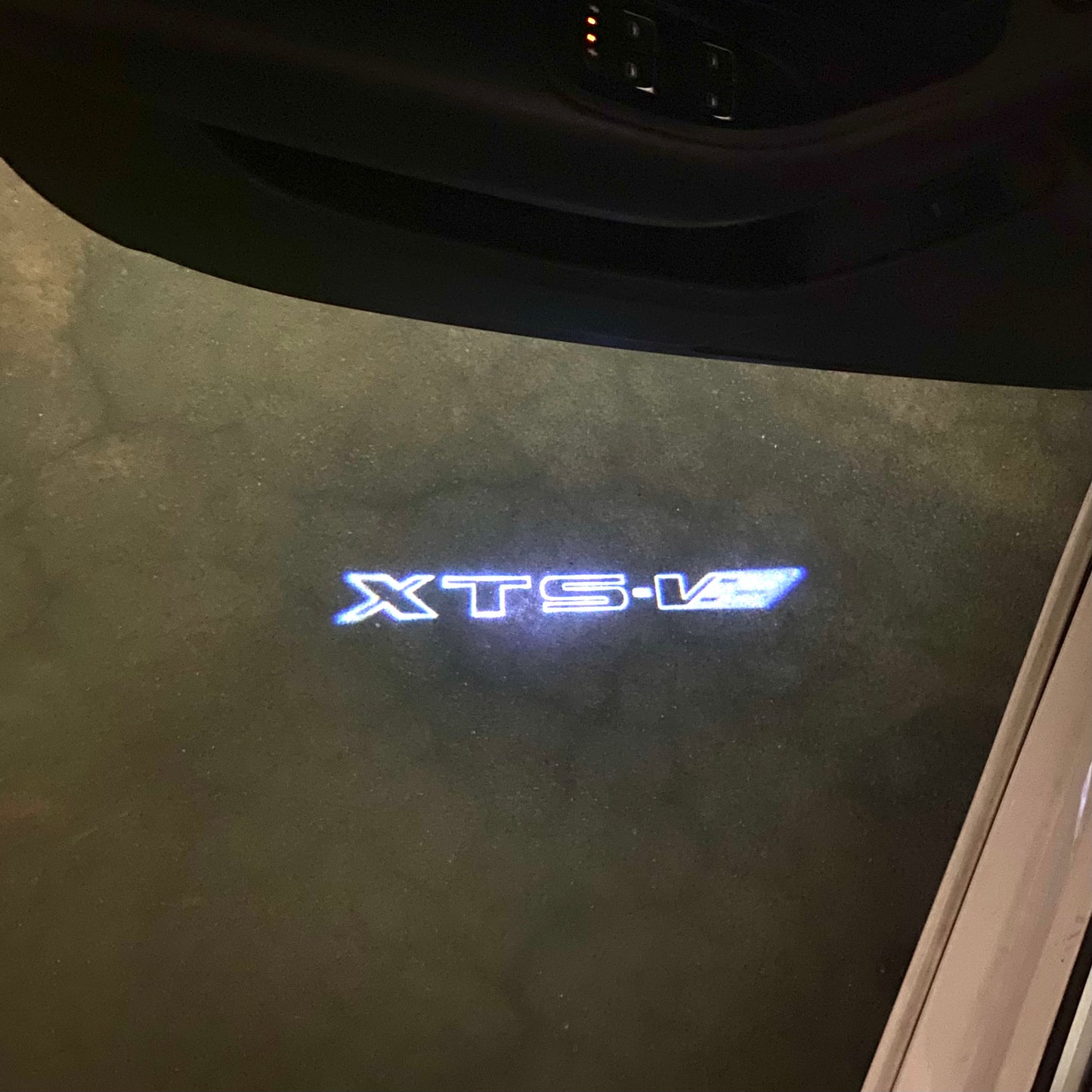 CADILLAC XTS LOGO PROJECTOT LIGHTS Nr.9780 (quantity 1 = 2 Logo Films /2 door lights)