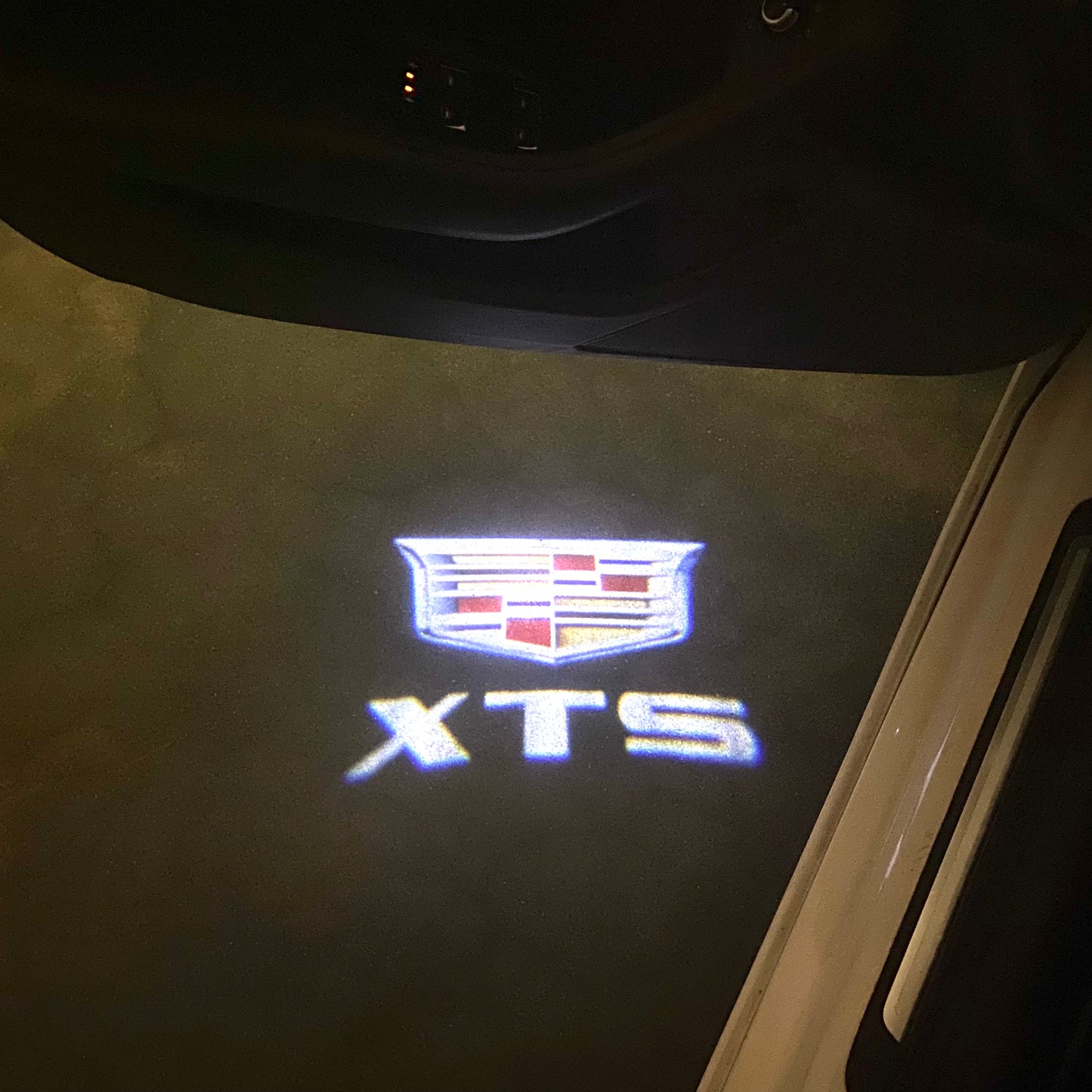 CADILLAC XTS LOGO PROJECTOT LIGHTS Nr.9742 (quantity 1 = 2 Logo Films /2 door lights)