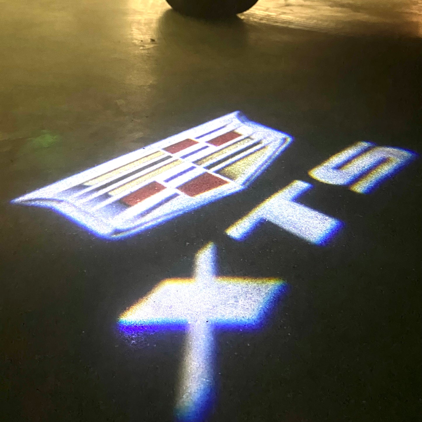 CADILLAC XTS LOGO PROJECTOT LIGHTS Nr.9742 (quantity 1 = 2 Logo Films /2 door lights)