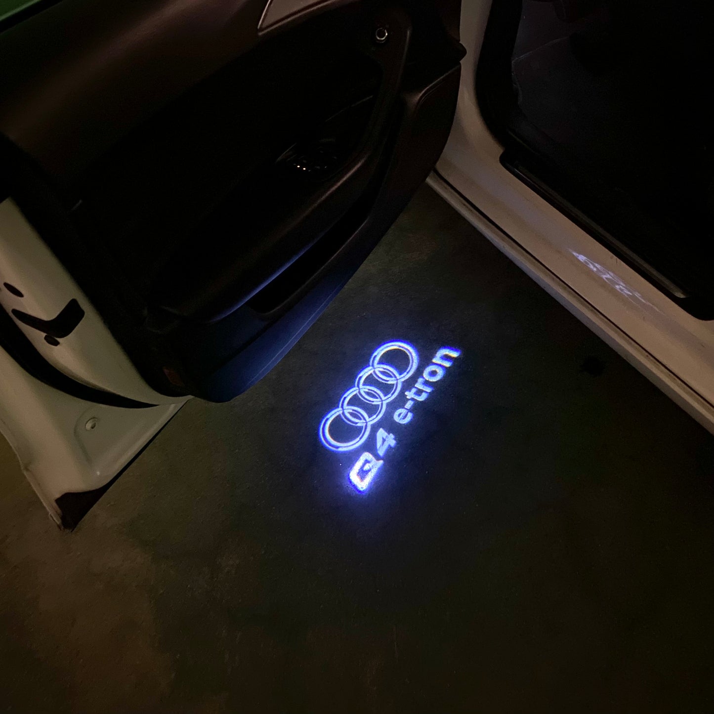 AUDI Q4 LOGO PROJECTOT LIGHTS (quantity 1 = 2 Logo Films /2 door lights)Nr.12B22