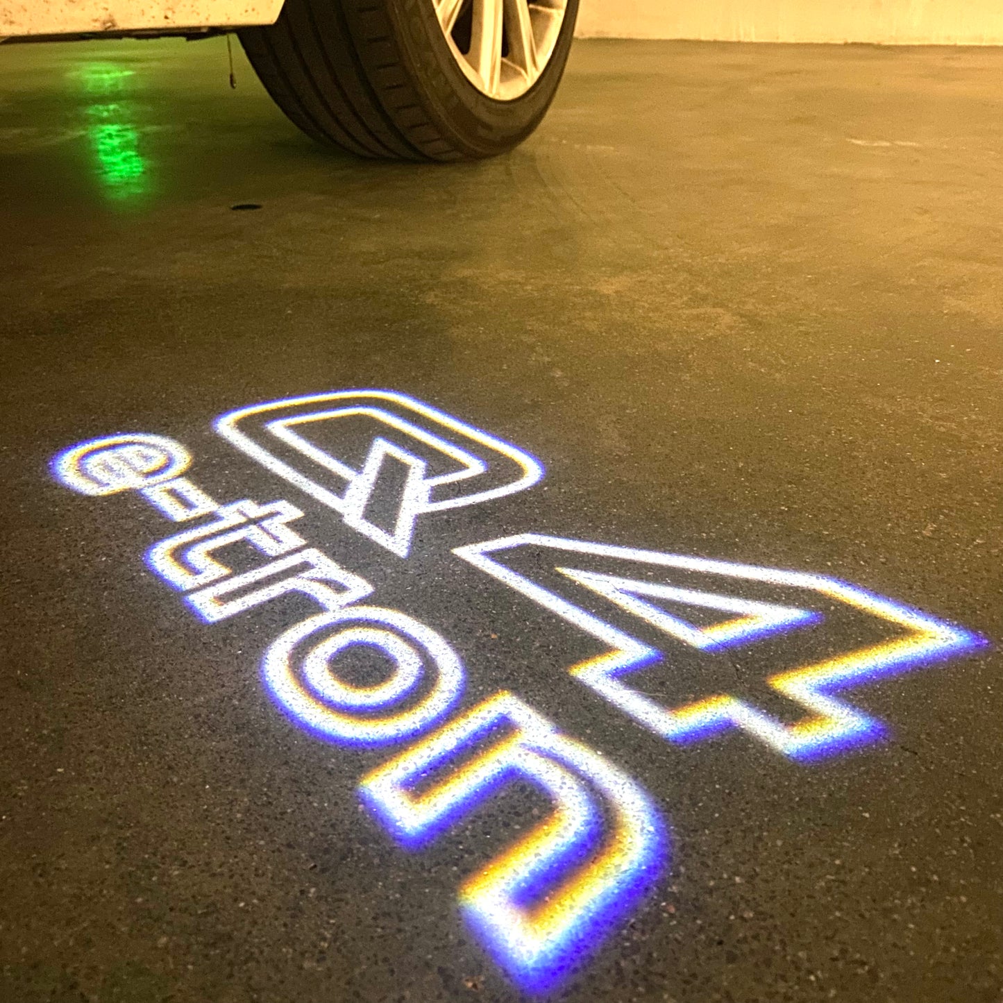 AUDI Q4 LOGO PROJECTOT LIGHTS (quantity 1 = 2 Logo Films /2 door lights)Nr.12B55