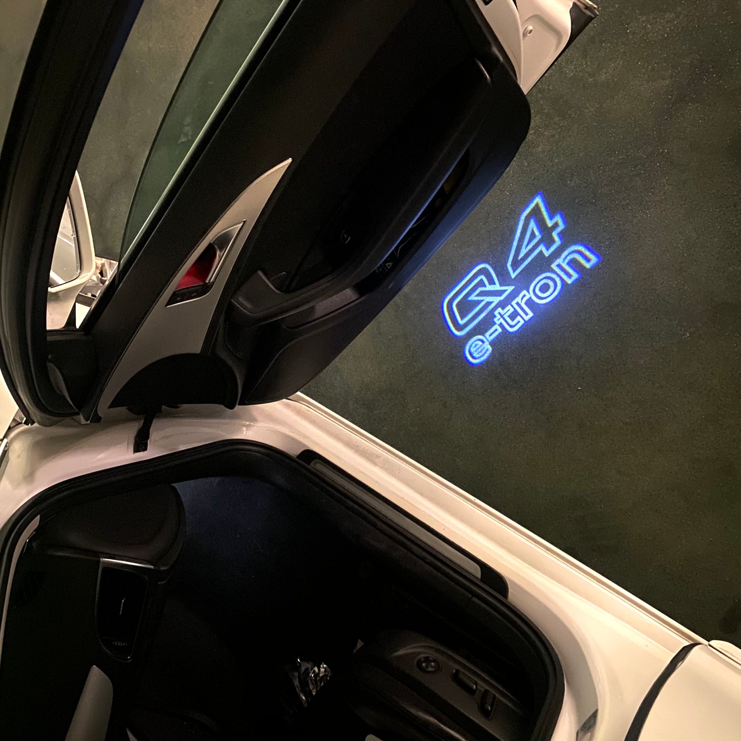 AUDI Q4 LOGO PROJECTOT LIGHTS (quantity 1 = 2 Logo Films /2 door lights)Nr.12B55