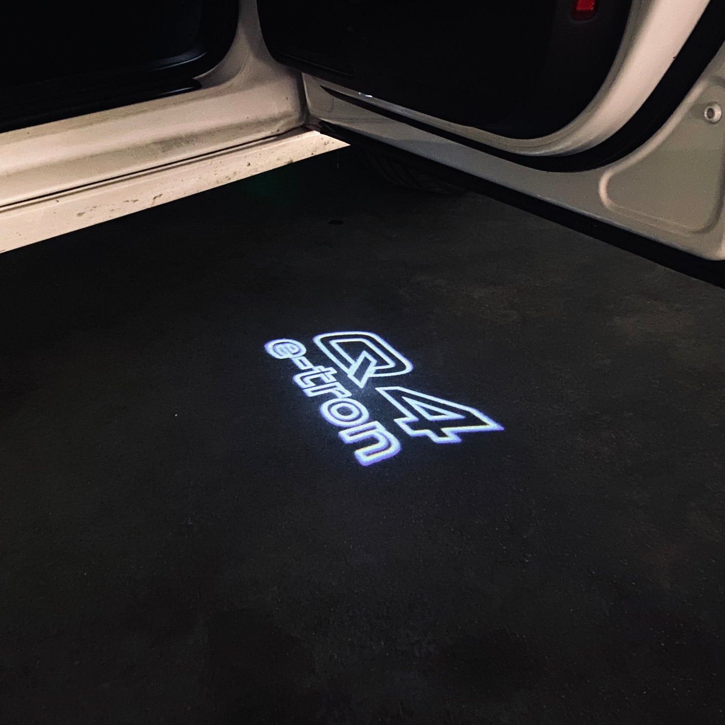 AUDI Q4 LOGO PROJECTOT LIGHTS (quantity 1 = 2 Logo Films /2 door lights)Nr.12B55