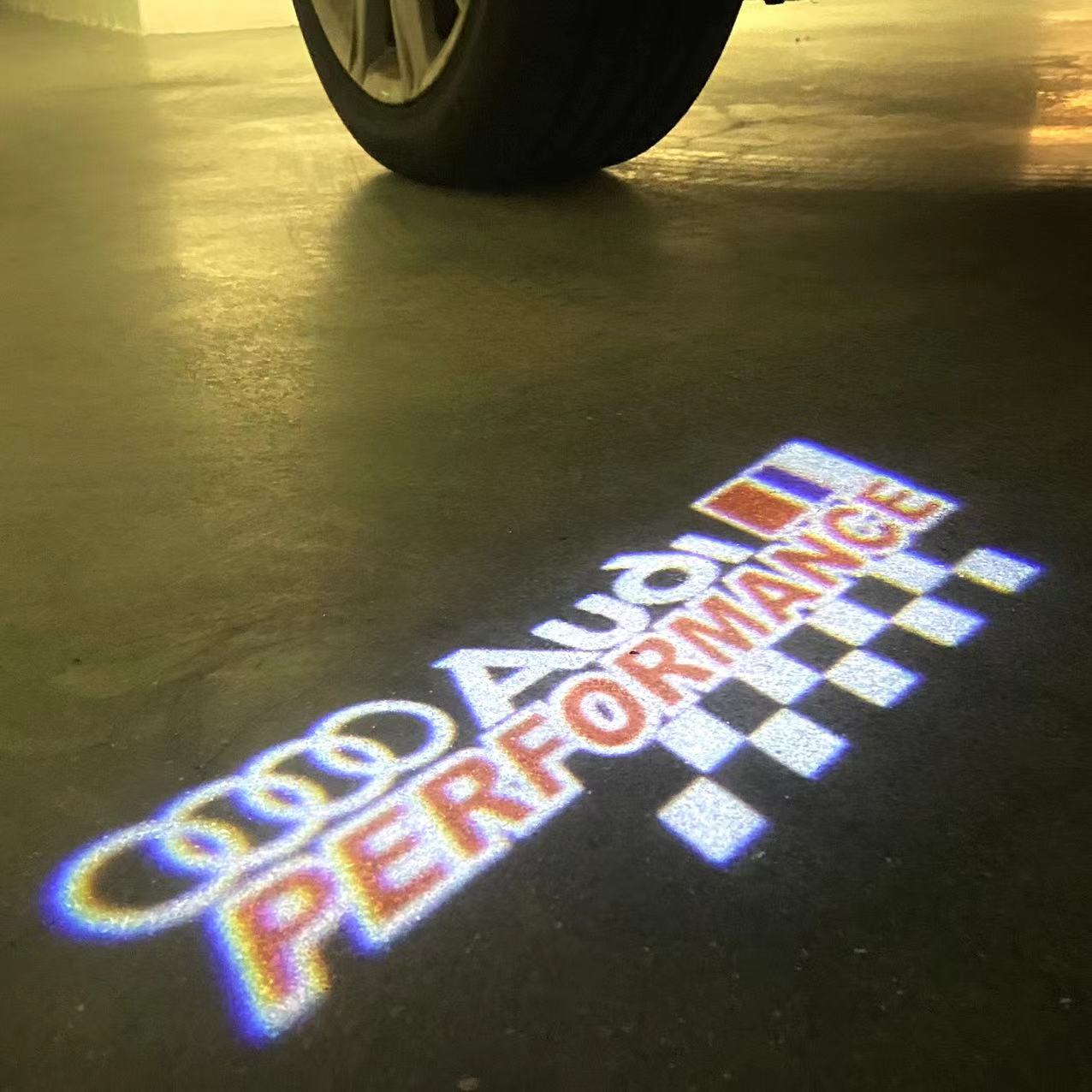 AUDI SPORT LOGO PROJECTOT LIGHTS (quantity 1 = 2 Logo Films /2 door lights)Nr.12B42