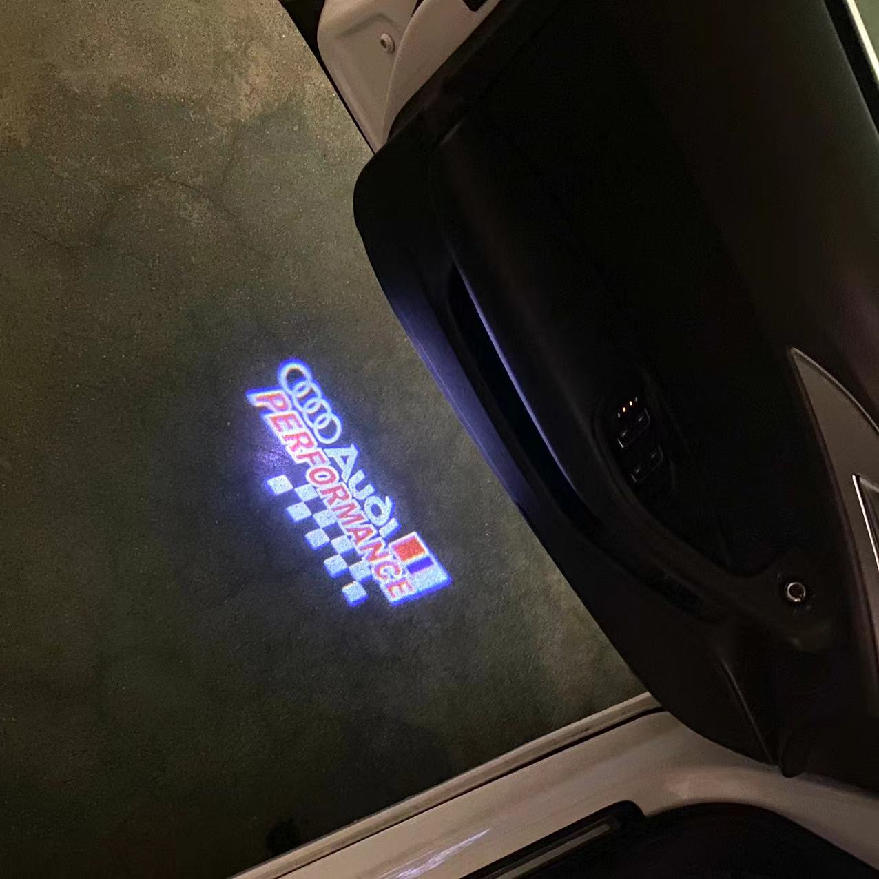 AUDI SPORT LOGO PROJECTOT LIGHTS (quantity 1 = 2 Logo Films /2 door lights)Nr.12B42