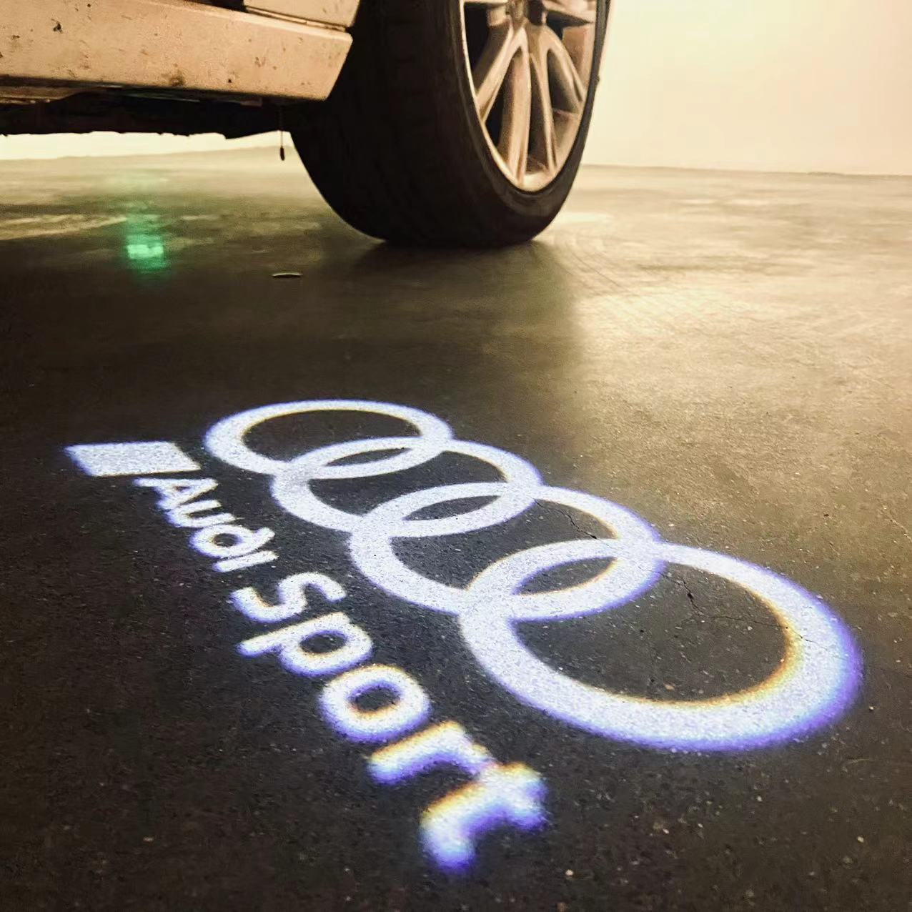 AUDI SPORT LOGO PROJECTOT LIGHTS (quantity 1 = 2 Logo Films /2 door lights)Nr.12B71
