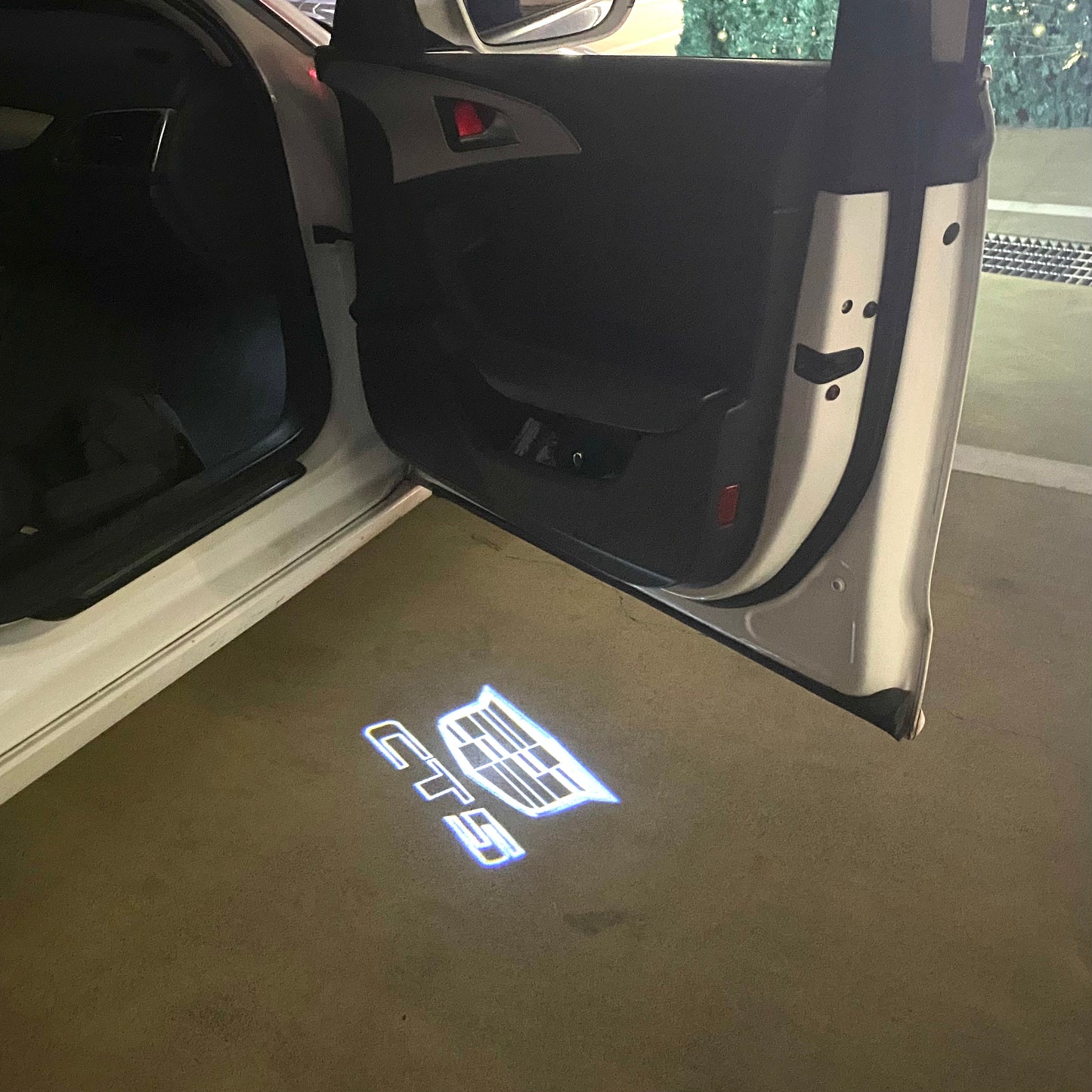 CADILLAC CTS LOGO PROJECTOT LIGHTS Nr.9734 (quantity 1 = 2 Logo Films /2 door lights)