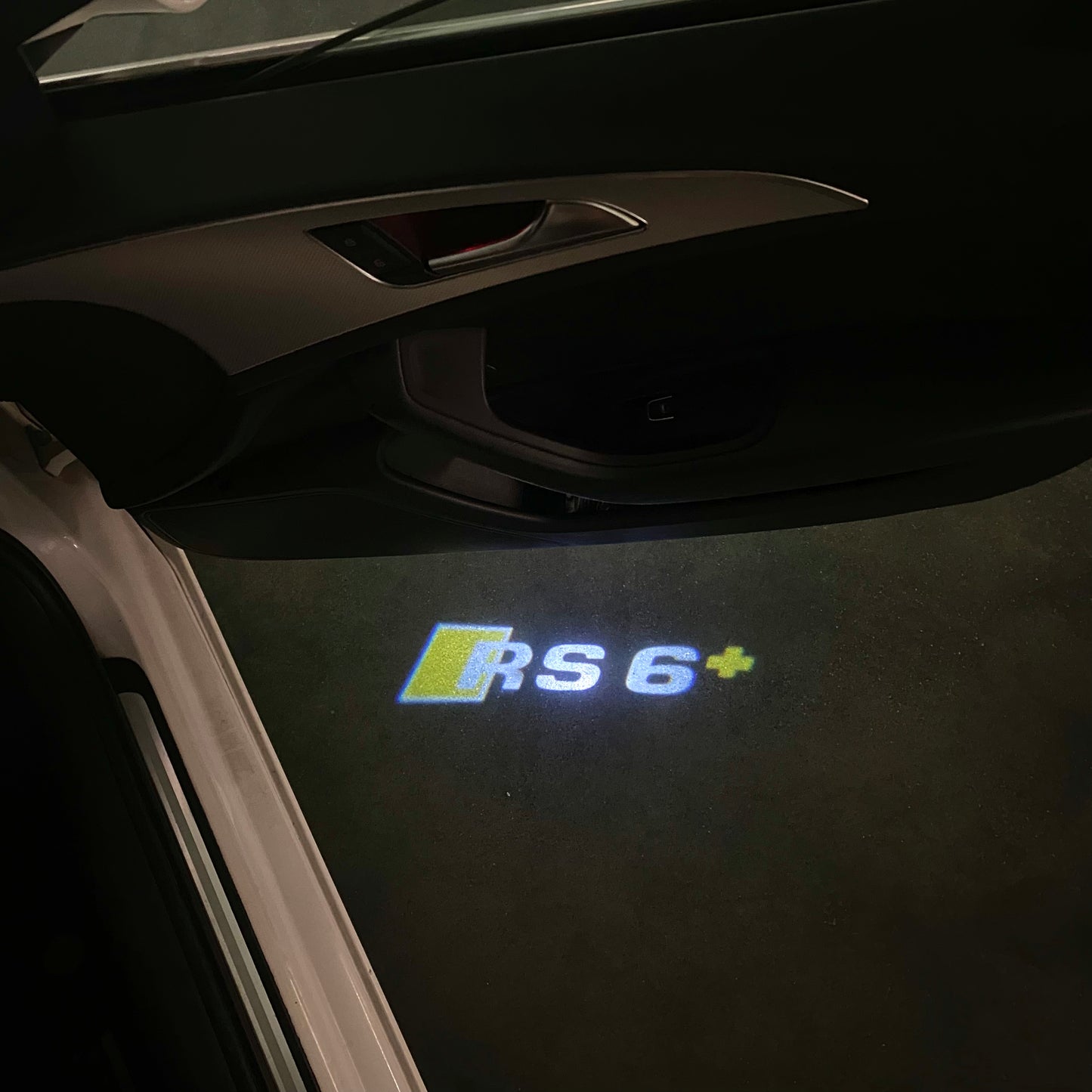 AUDI RS6+ LOGO PROJECTOT LIGHTS Nr.46Bgg (quantity 1 = 2 Logo Films /2 door lights)
