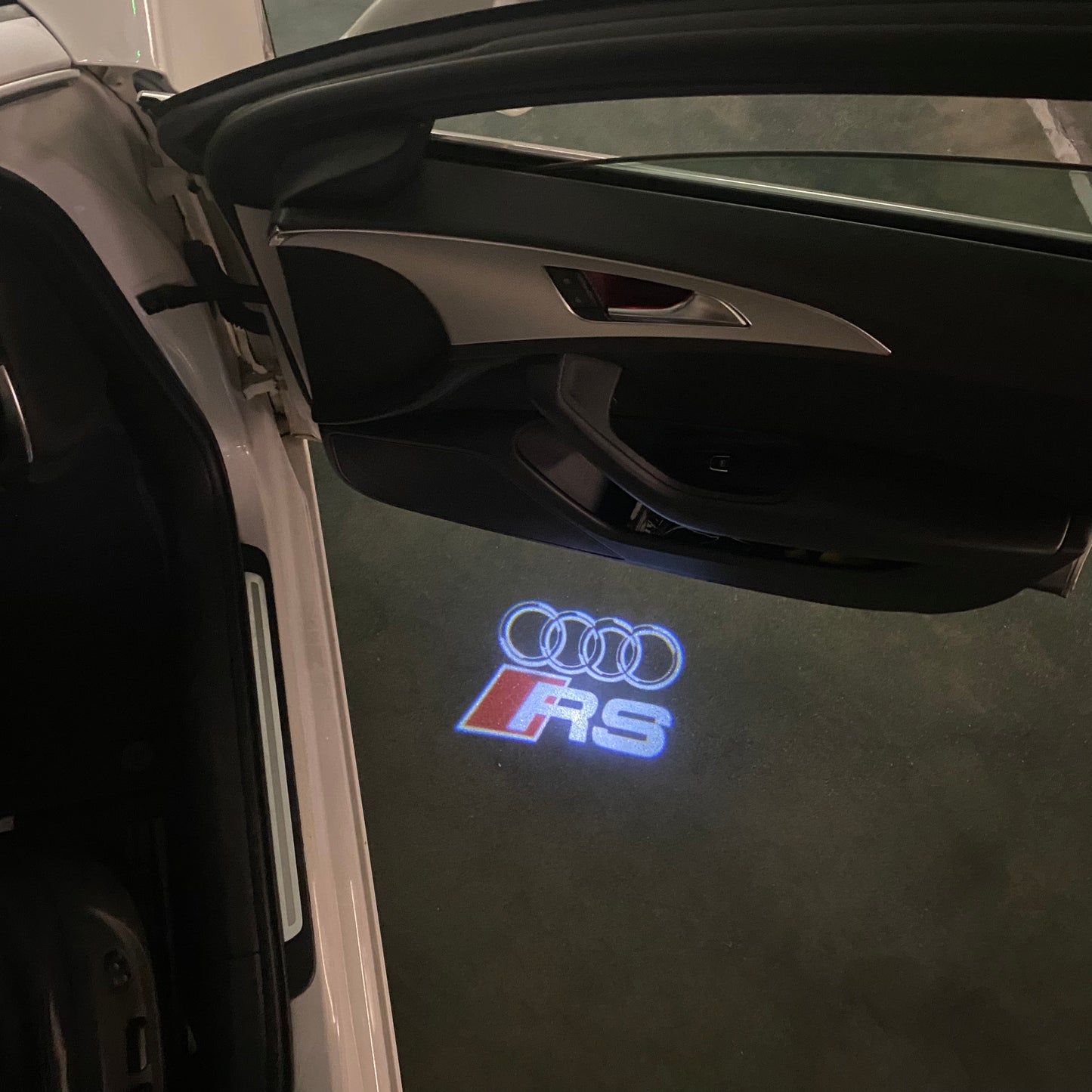 AUDI RS LOGO PROJECTOT LIGHTS (quantity 1 = 2 Logo Films /2 door lights)Nr.12B35