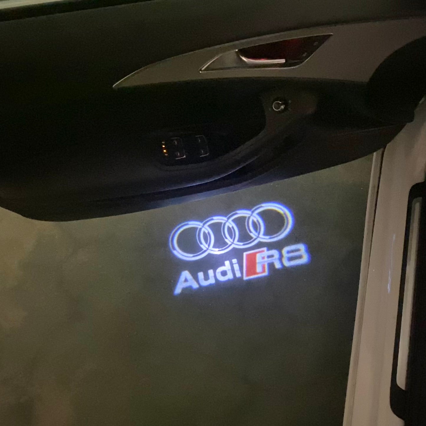 AUDI R8 LOGO PROJECTOT LIGHTS (quantity 1 = 2 Logo Films /2 door lights)Nr.12B54