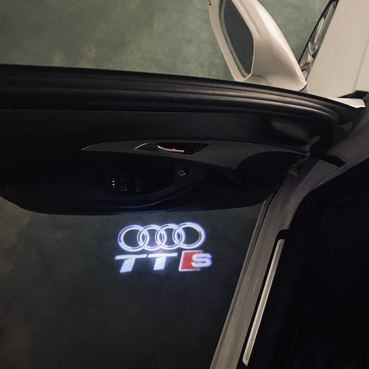 AUDI TTS LOGO PROJECTOT LIGHTS (quantity 1 = 2 Logo Films /2 door lights)Nr.12B29