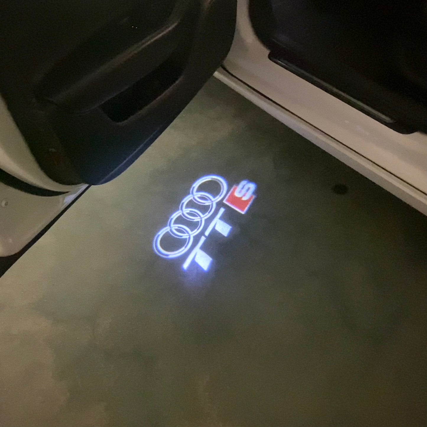 AUDI TTS LOGO PROJECTOT LIGHTS (quantity 1 = 2 Logo Films /2 door lights)Nr.12B29