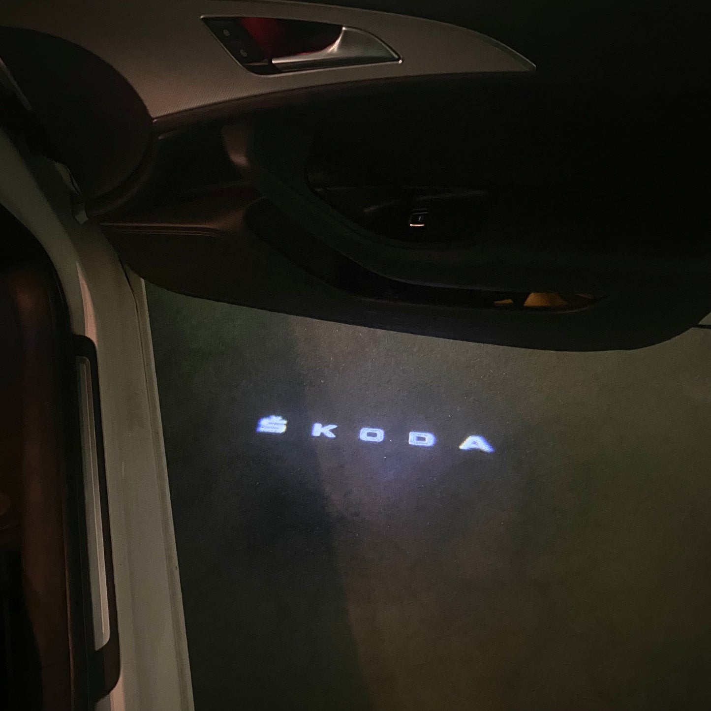SKODA ORIGINAL LOGO PROJECTOT LIGHTS Nr.248 (quantity 1 = 2 Logo Films /2 door lights)