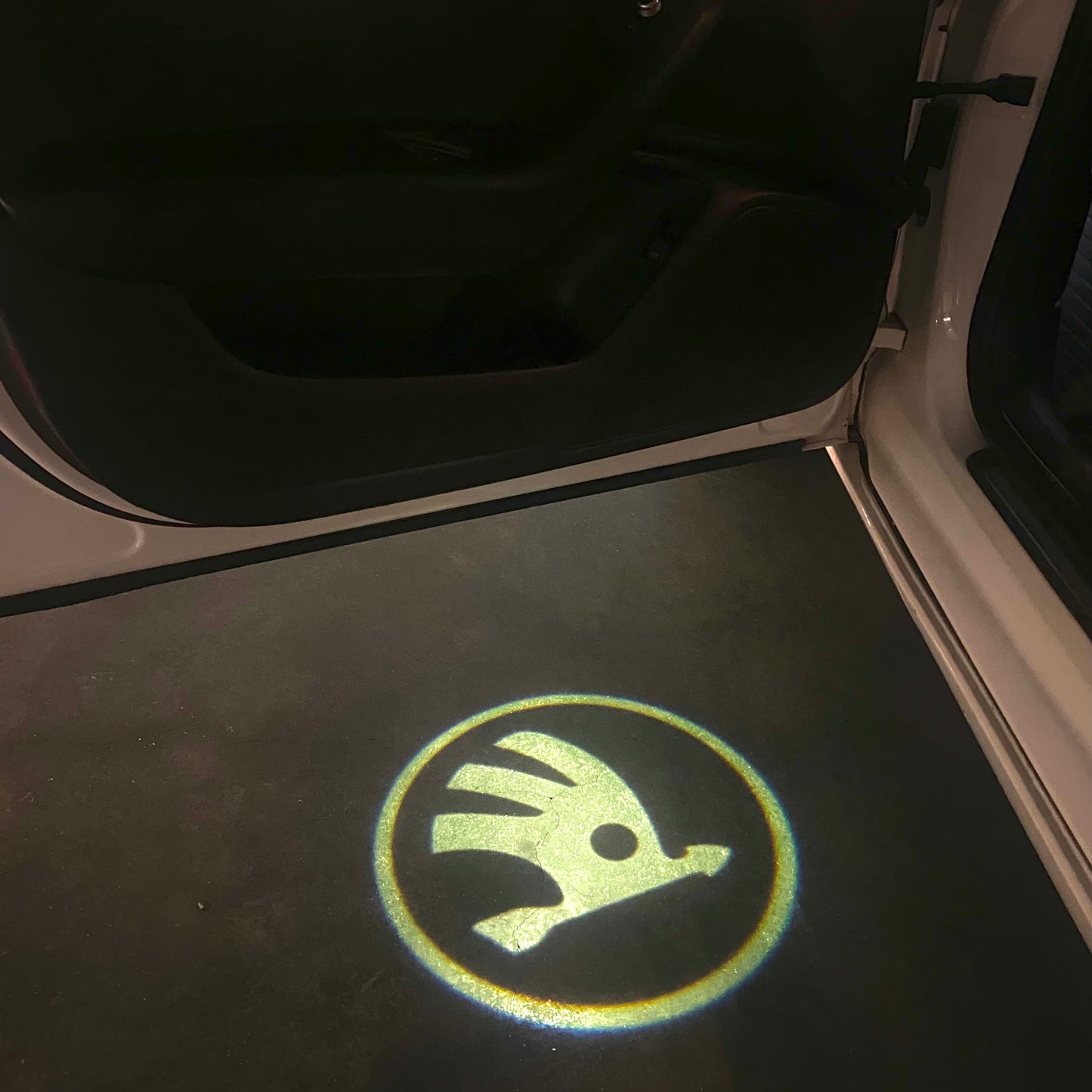 SKODA ORIGINAL LOGO PROJECTOT LIGHTS Nr.13(quantity 1 = 2 Logo Film / 2 door lights)