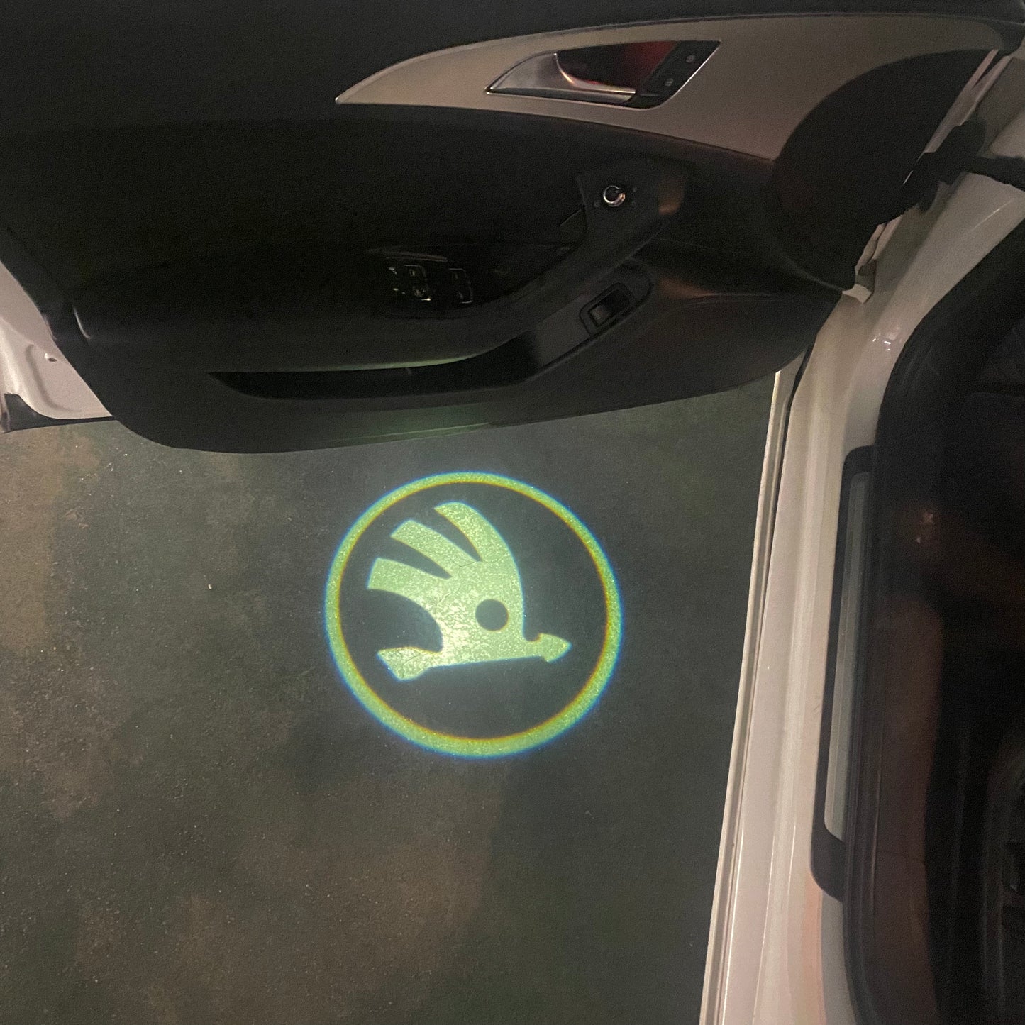 SKODA ORIGINAL LOGO PROJECTOT LIGHTS Nr.13(quantity 1 = 2 Logo Film / 2 door lights)