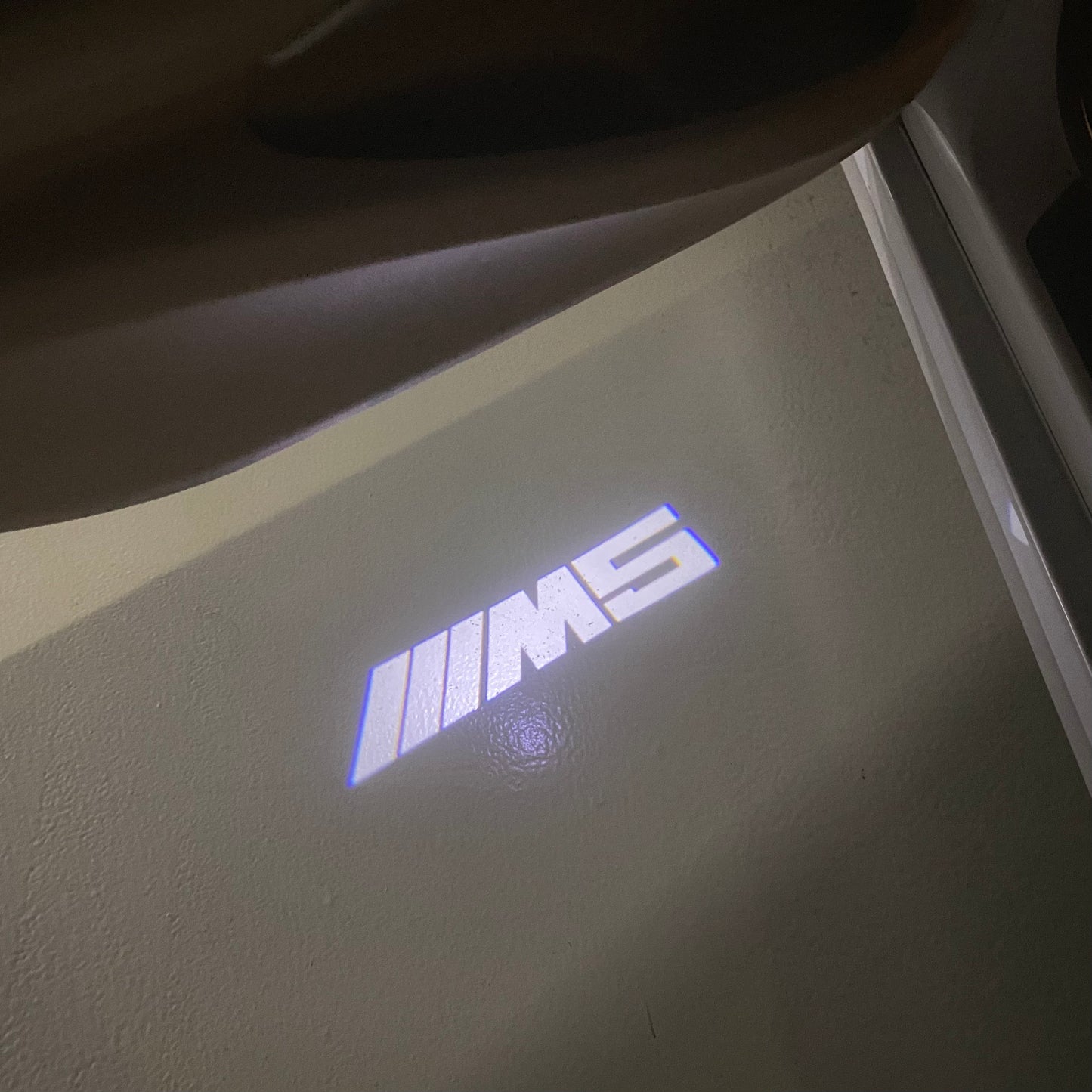 BMW 5 SERIES M5 LOGO PROJECTOT LIGHTS (quantity 1 = 1 sets/2 door lights) Nr.6024q68