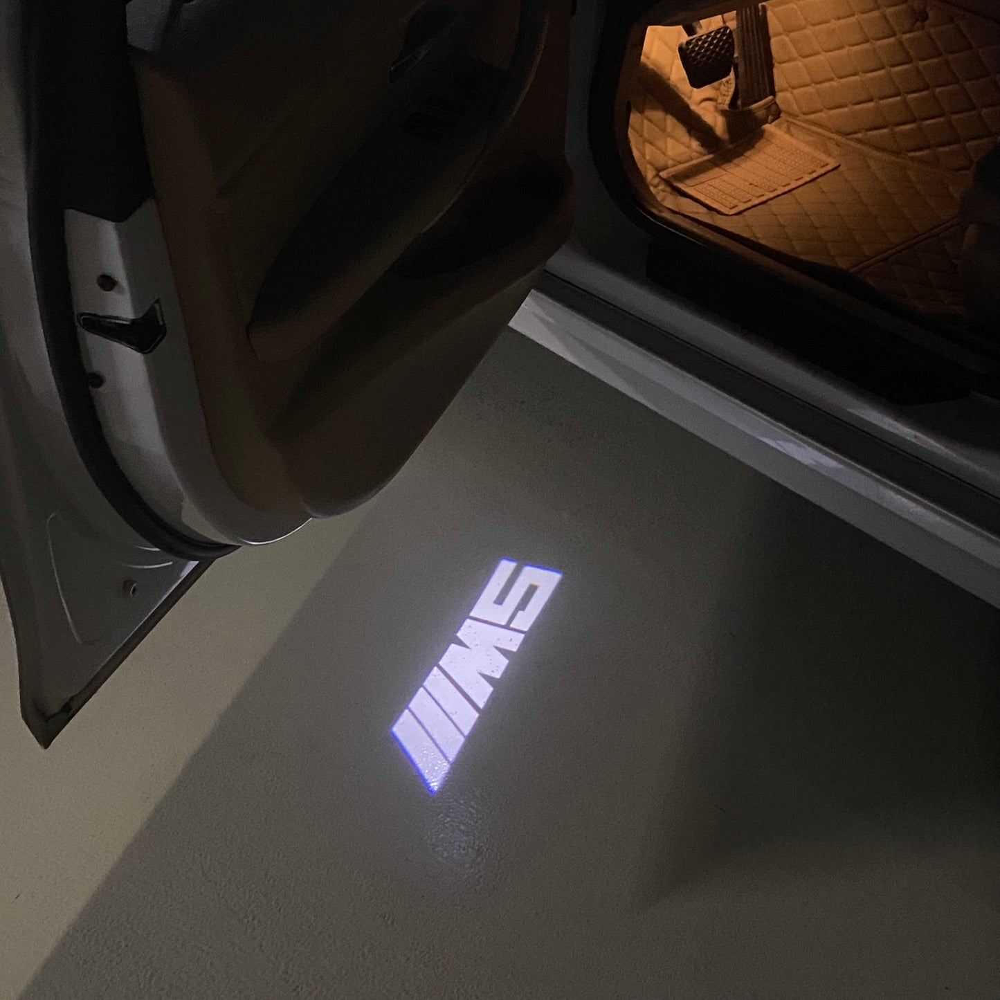 BMW 5 SERIES M5 LOGO PROJECTOT LIGHTS (quantity 1 = 1 sets/2 door lights) Nr.6024q68