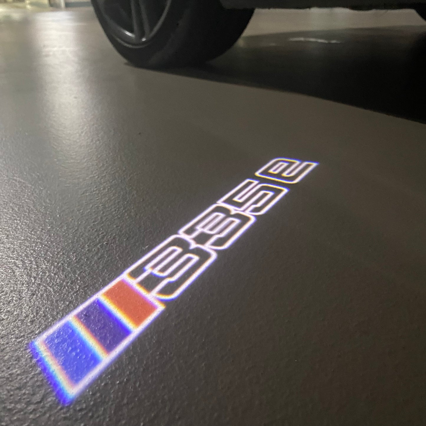 BMW 3 SERIES 335e LOGO PROJECTOT LIGHTS (quantity 1 = 1 sets/2 door lights) Nr.6024q302