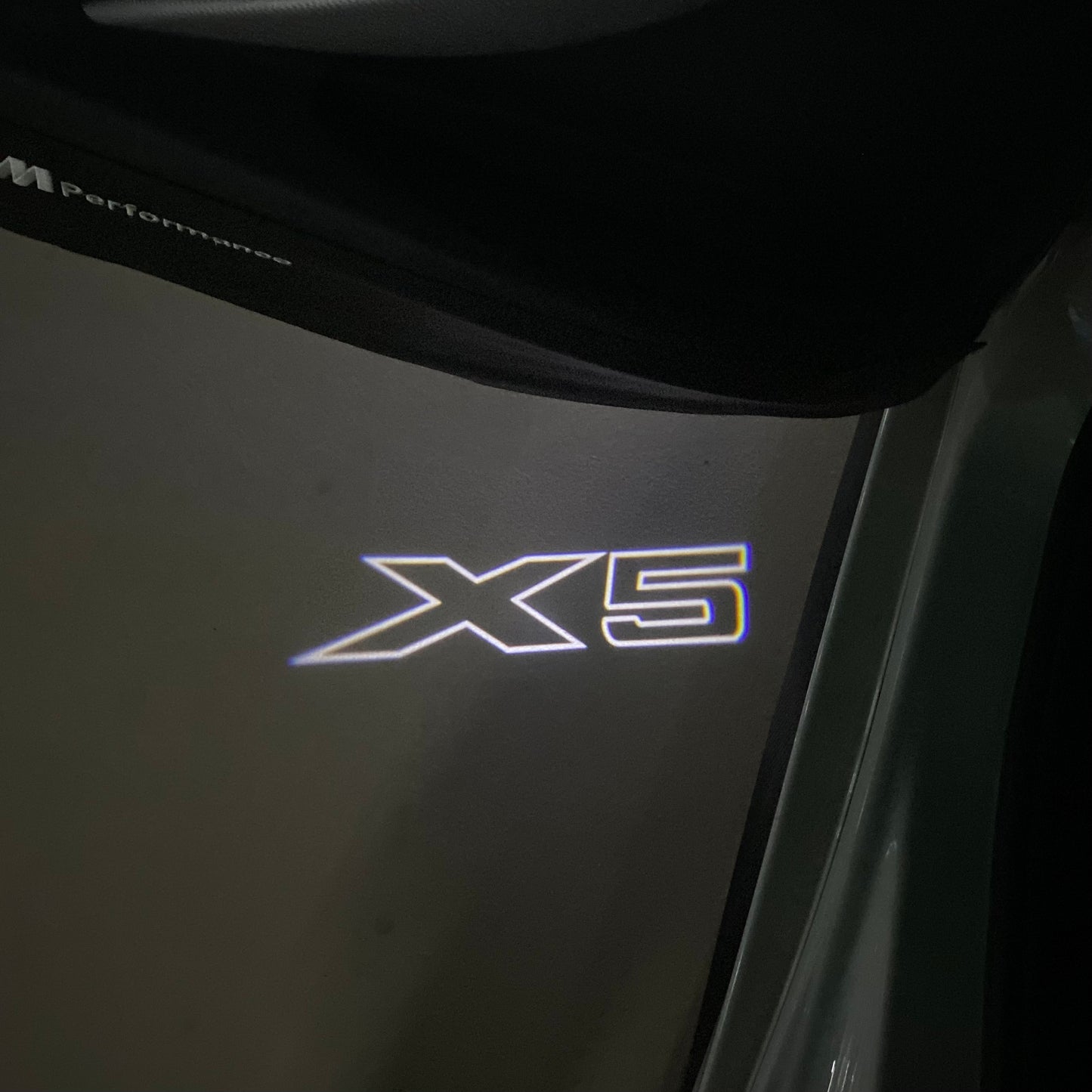 BMW X5 LOGO PROJECTOT LIGHTS (quantity 1 = 1 sets/2 door lights) Nr.6024q0t067