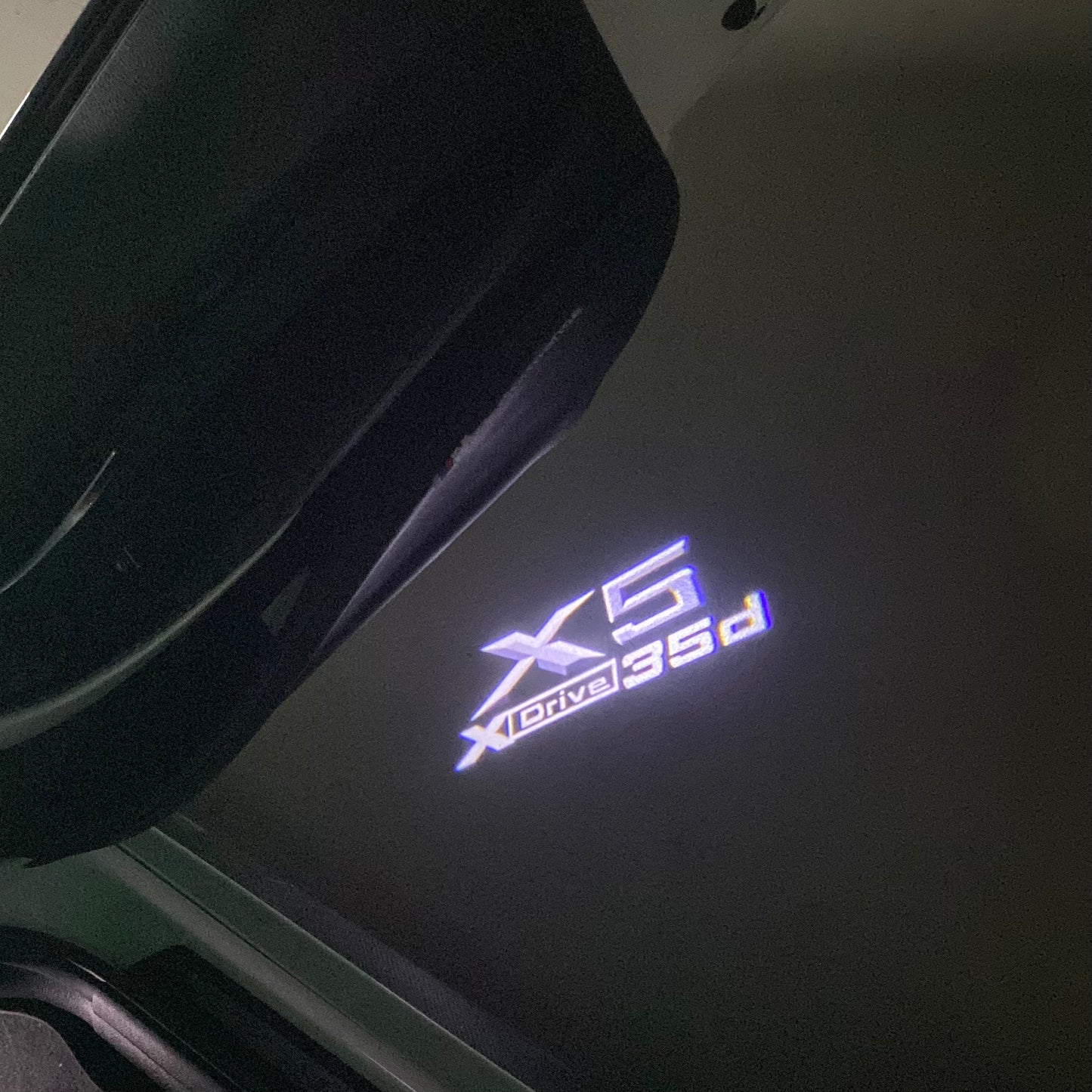 BMW X5 XDrive 35d LOGO PROJECTOT LIGHTS (quantity 1 = 1 sets/2 door lights) Nr.6024q0t066