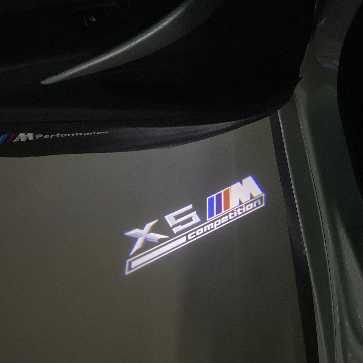 BMW X5M LOGO PROJECTOT LIGHTS (quantity 1 = 1 sets/2 door lights) Nr.6024q0t049
