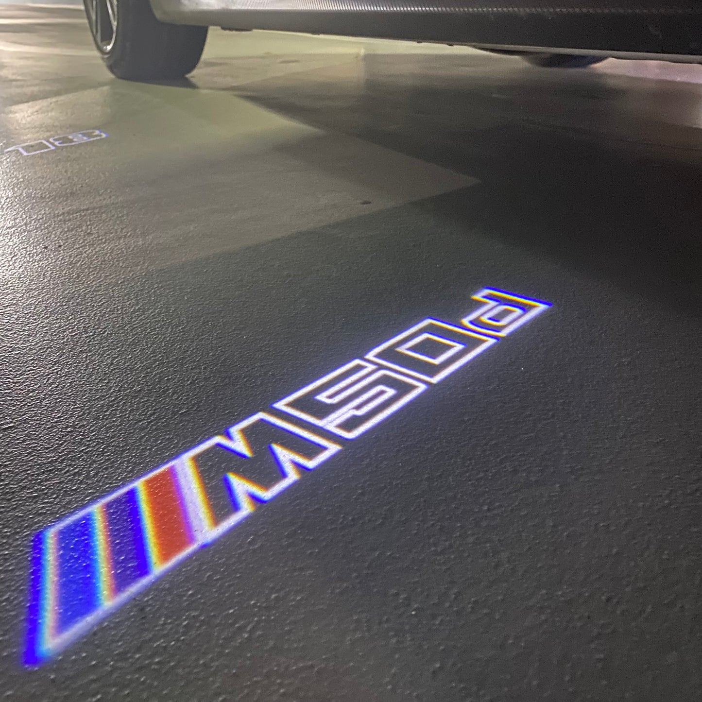 BMW X5 / X5M M50d LOGO PROJECTOT LIGHTS (quantity 1 = 1 sets/2 door lights) Nr.6024q0t059