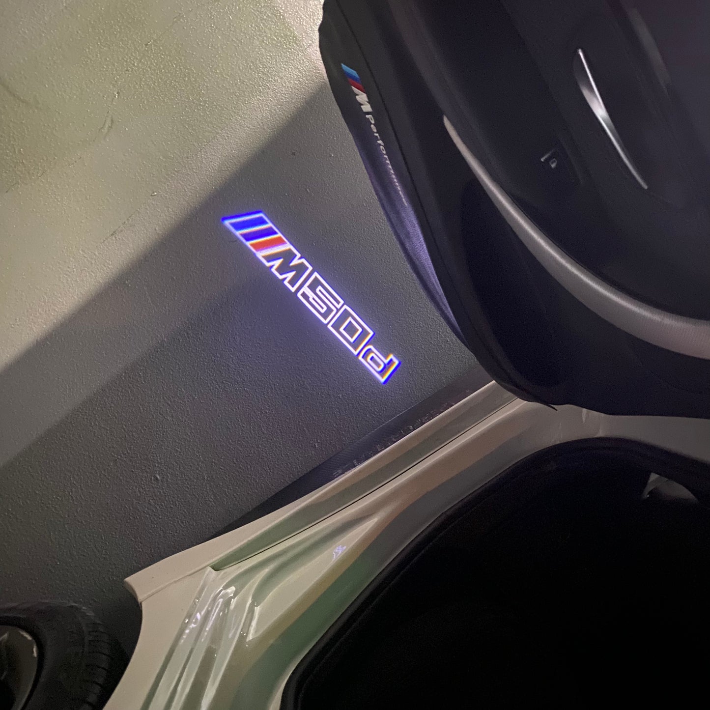 BMW X5 / X5M M50d LOGO PROJECTOT LIGHTS (quantity 1 = 1 sets/2 door lights) Nr.6024q0t059